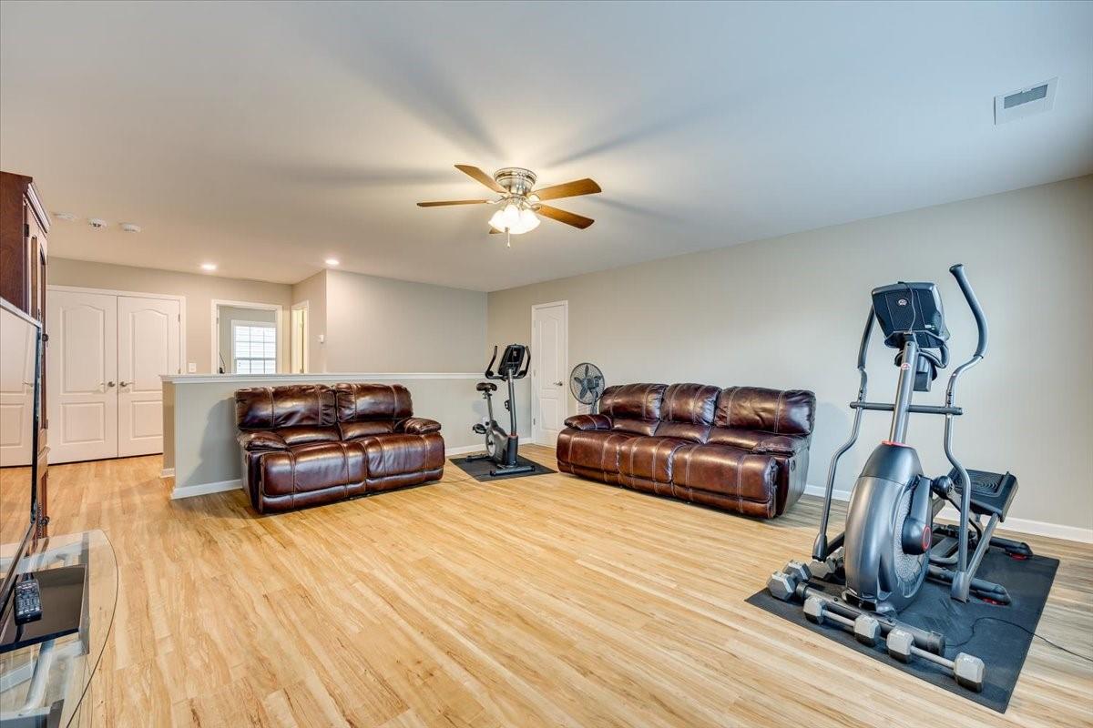 2350 Talon Point Circle Fort Mill, SC 29715 - Photo 36 of 45 a living room with furniture and a wooden floor