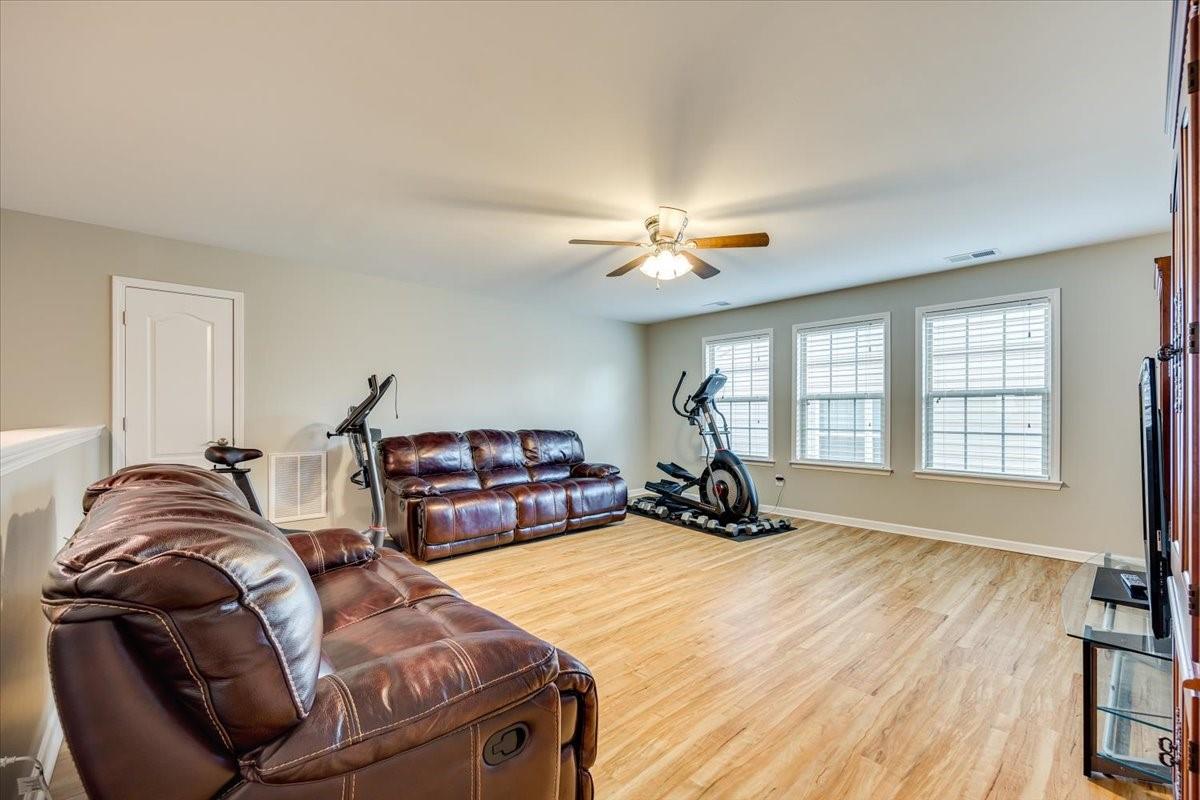 2350 Talon Point Circle Fort Mill, SC 29715 - Photo 37 of 45 a bed room with a bed and a chandelier