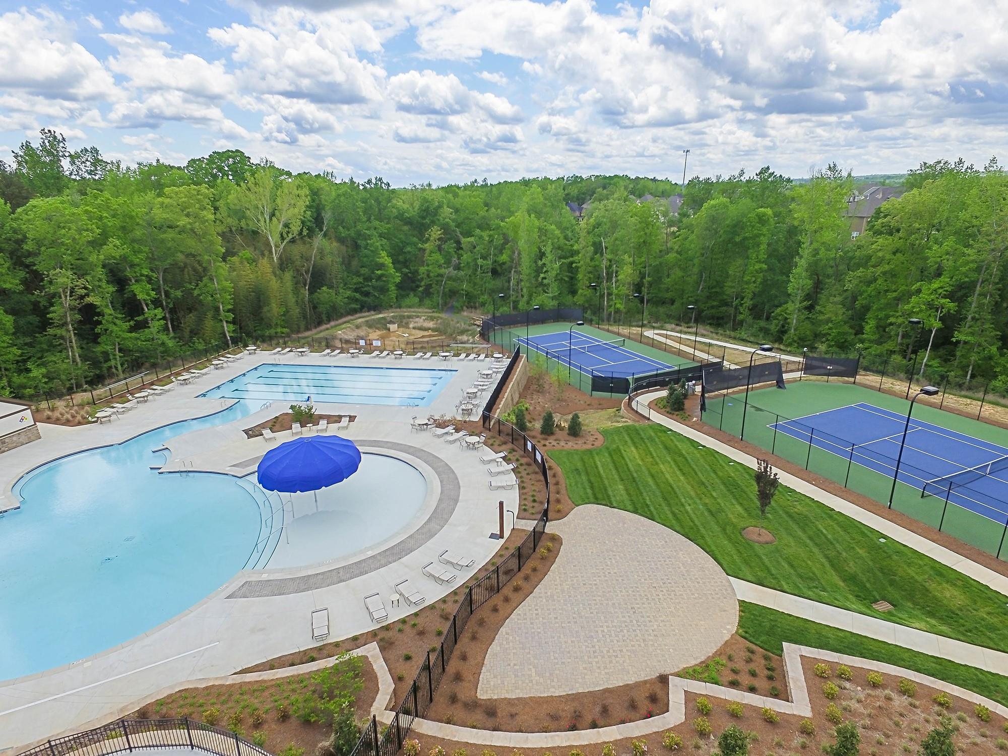 2350 Talon Point Circle Fort Mill, SC 29715 - Photo 44 of 45 swimming pool with trees in the background