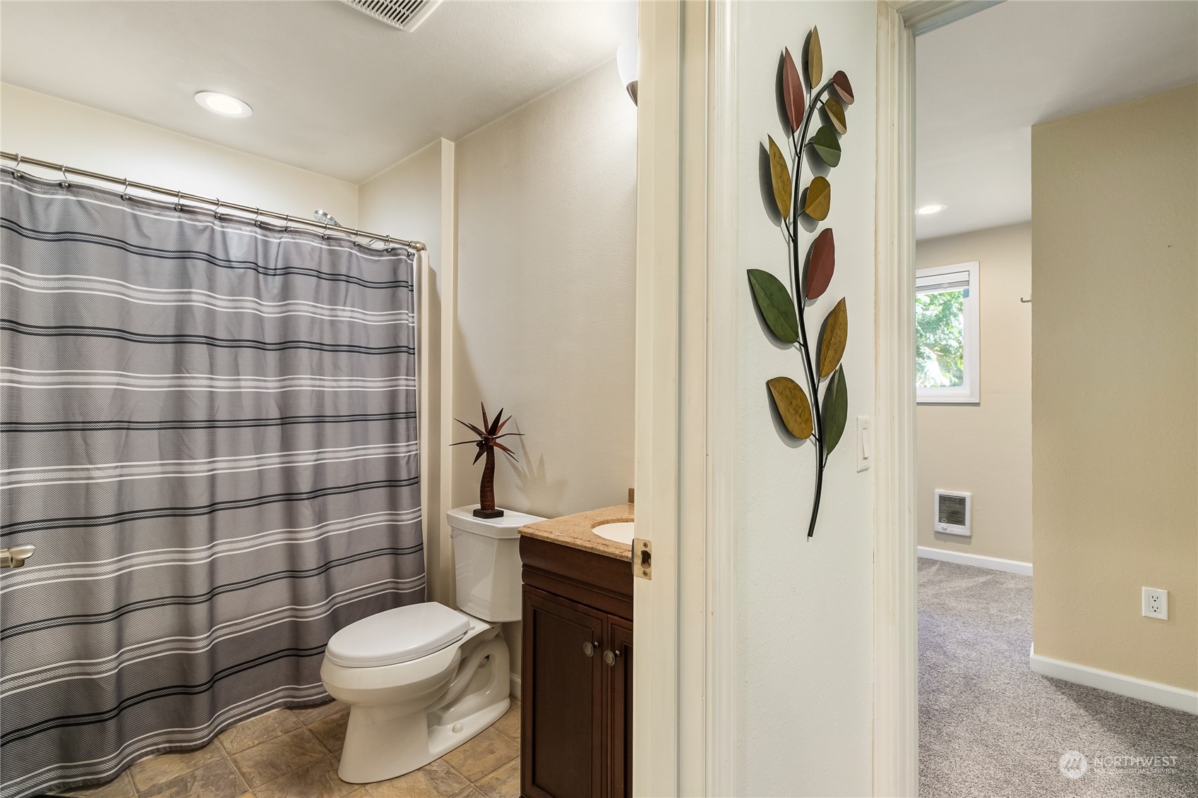 8 Topper Drive Bellingham, WA 98229 - Photo 11 of 32 a white toilet sitting next to a shower curtain