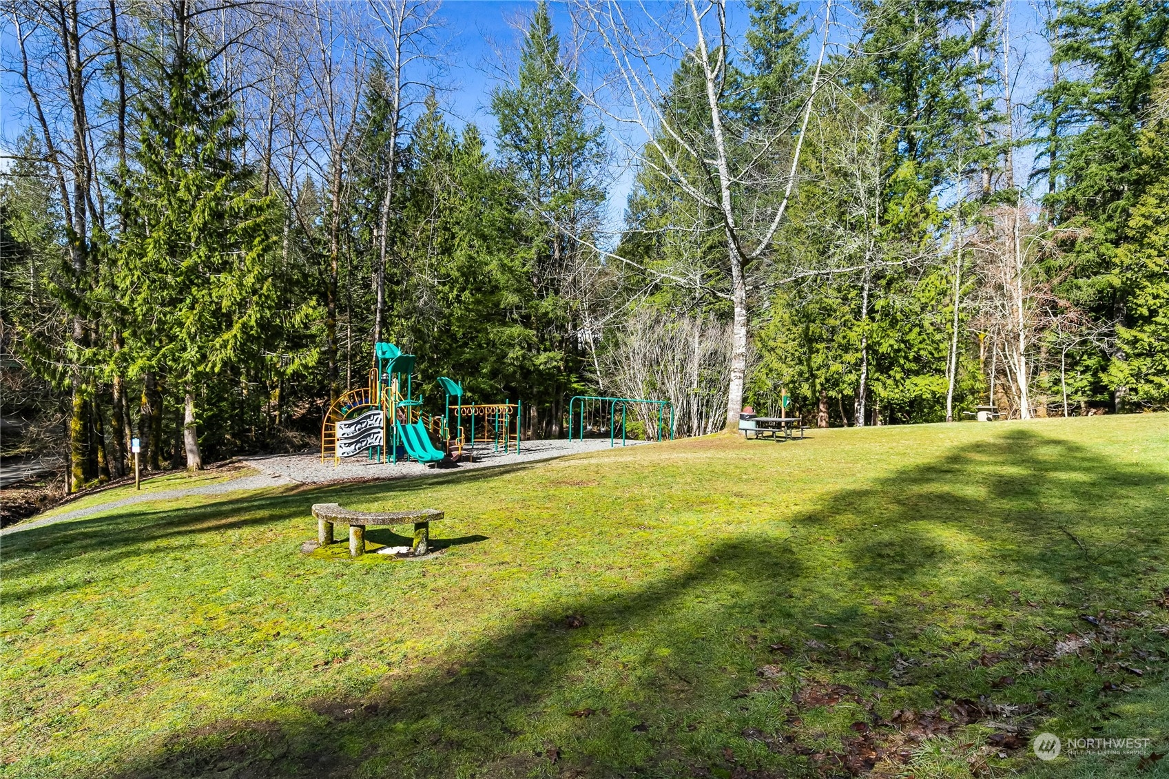 8 Topper Drive Bellingham, WA 98229 - Photo 26 of 32 a view of a swimming pool with an outdoor seating and yard