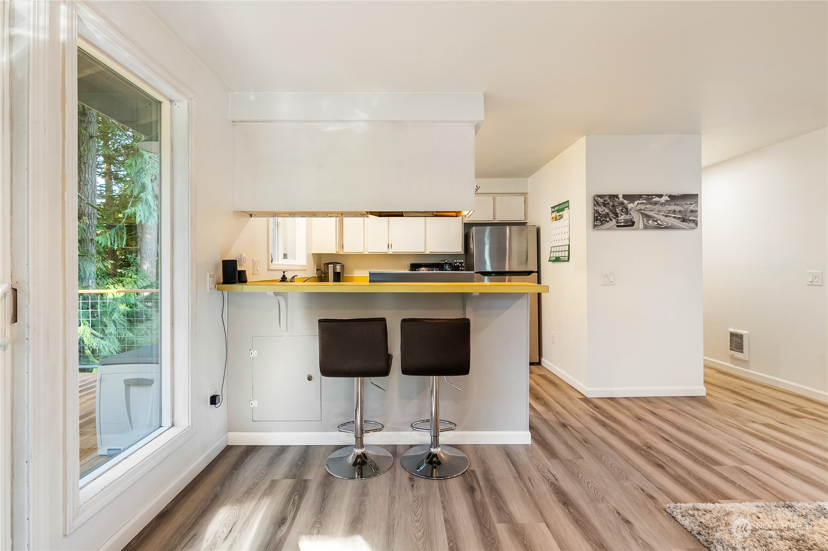 8 Topper Drive Bellingham, WA 98229 - Photo 6 of 32 a kitchen with granite countertop a stove a sink and a refrigerator