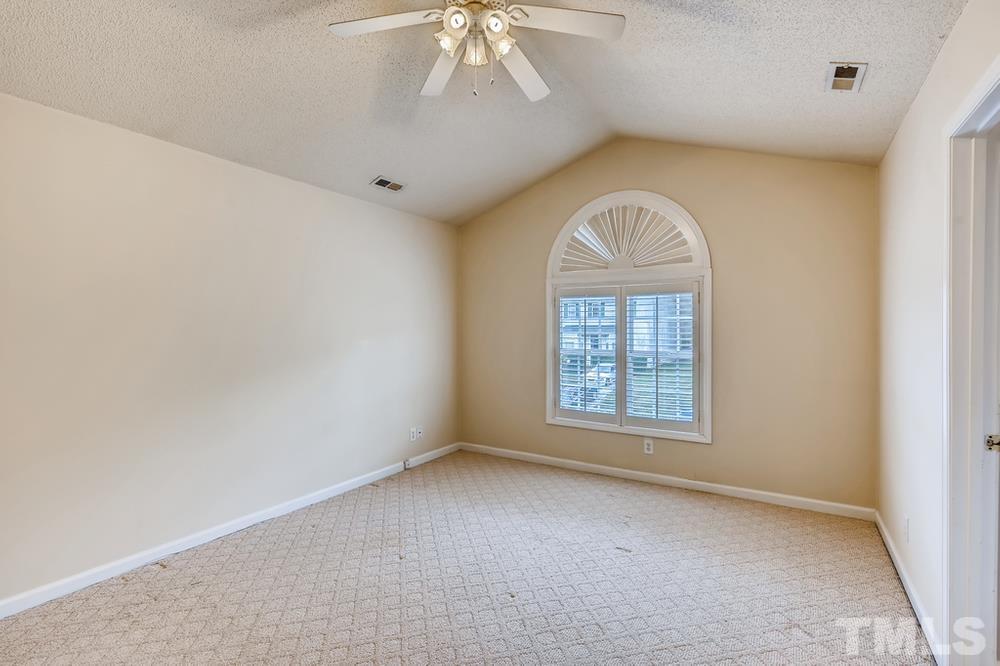 4008 Beaufain Street Raleigh, NC 27604 - Photo 15 of 30 an empty room with a window