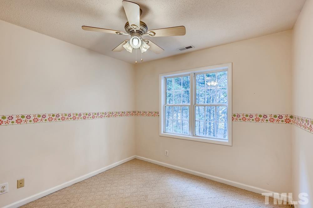 4008 Beaufain Street Raleigh, NC 27604 - Photo 22 of 30 a view of an empty room with a window