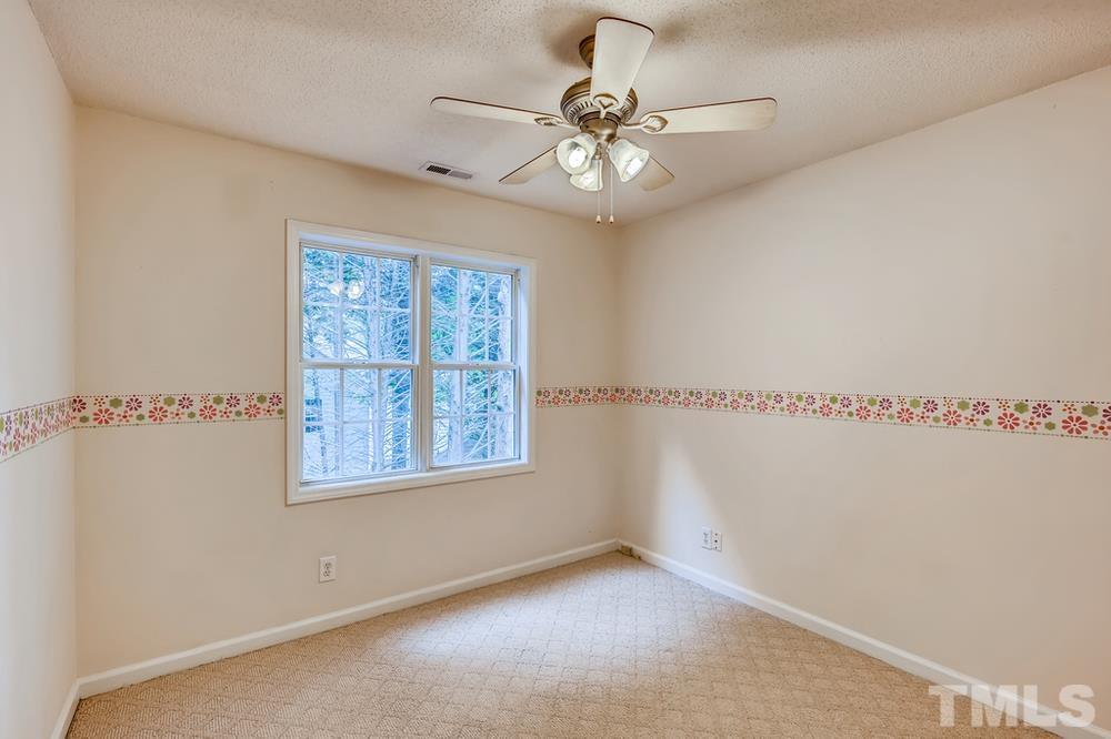 4008 Beaufain Street Raleigh, NC 27604 - Photo 23 of 30 a view of an empty room with a window