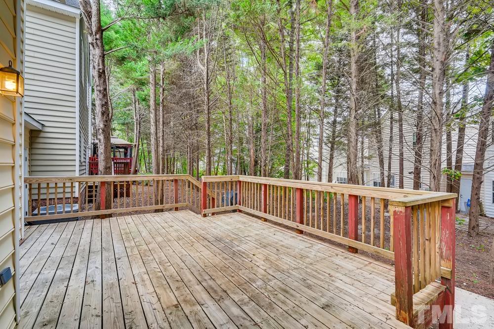 4008 Beaufain Street Raleigh, NC 27604 - Photo 29 of 30 a view of a wooden deck
