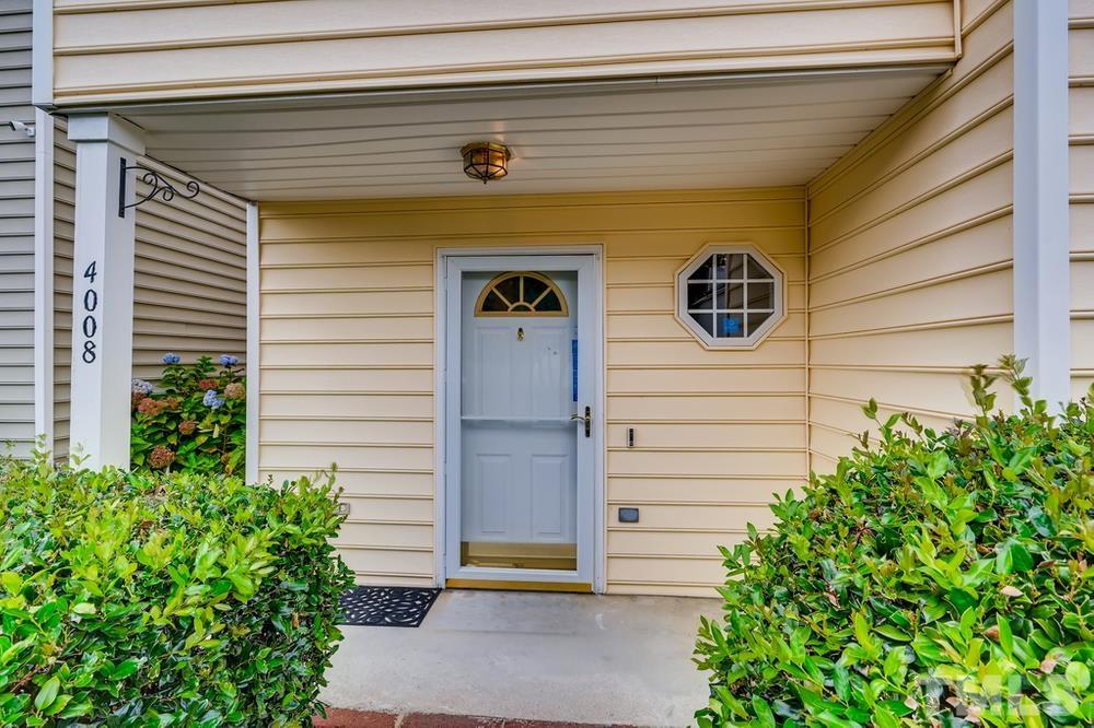 4008 Beaufain Street Raleigh, NC 27604 - Photo 4 of 30 a view of front door of house