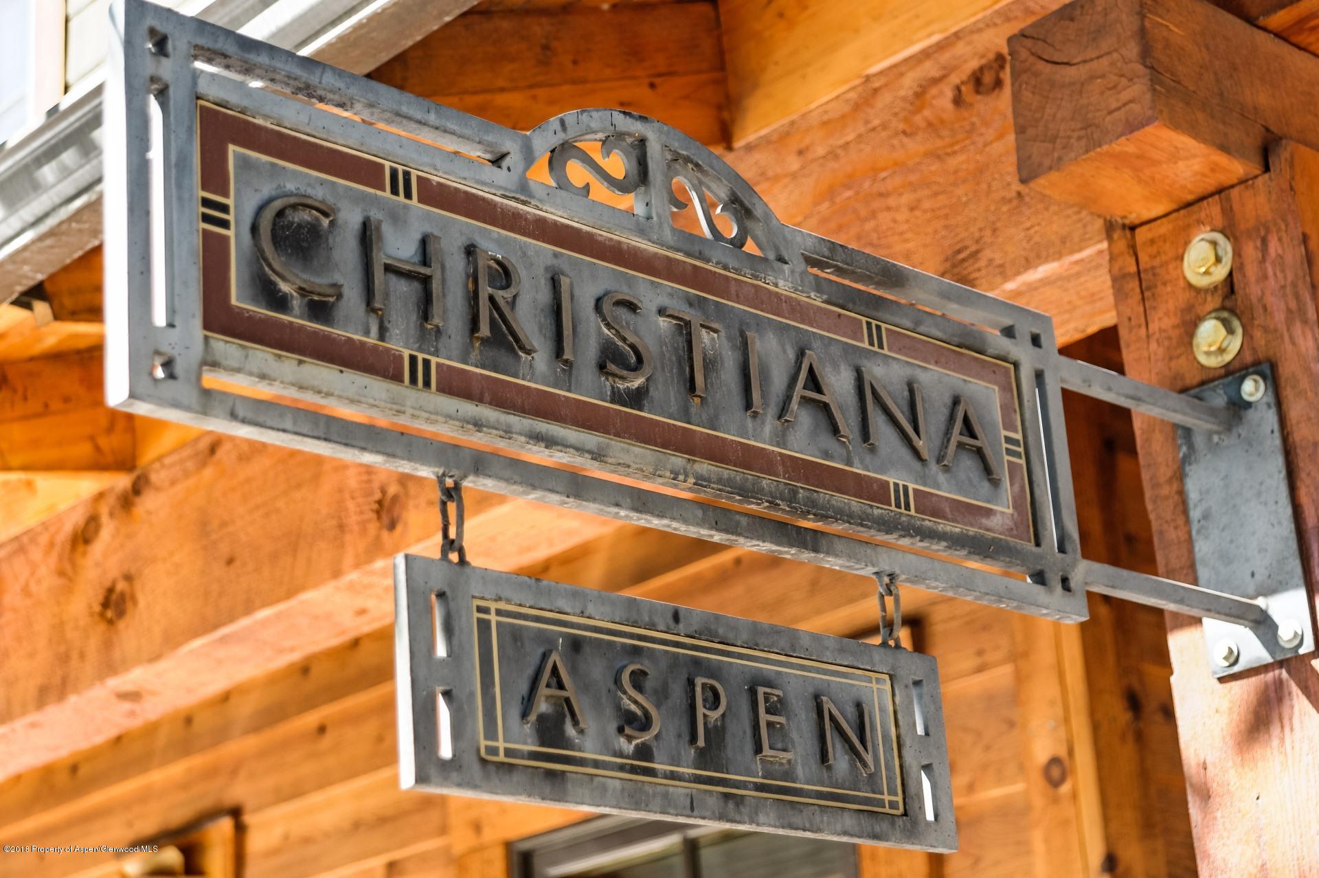 501 West Main Street, Unit A106 Aspen, CO 81611 - Photo 12 of 13 a street sign on a pole