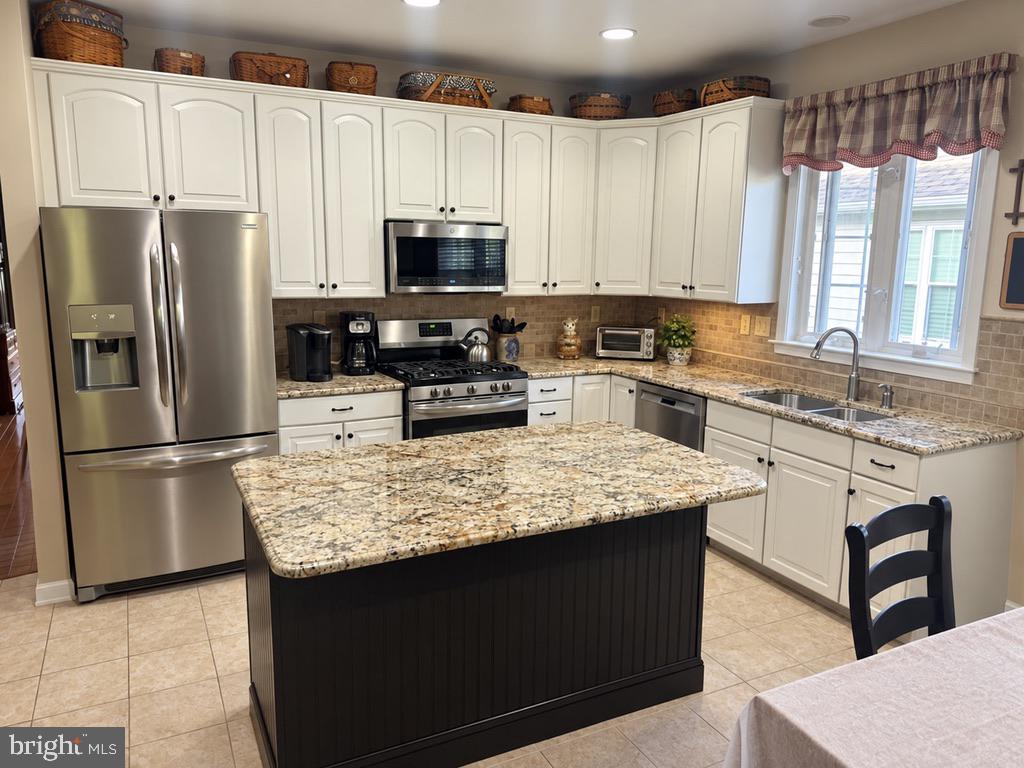 212 Gilmer Road Coatesville, PA 19320 - Photo 11 of 27 Recently Renovated Kitchen with Granite