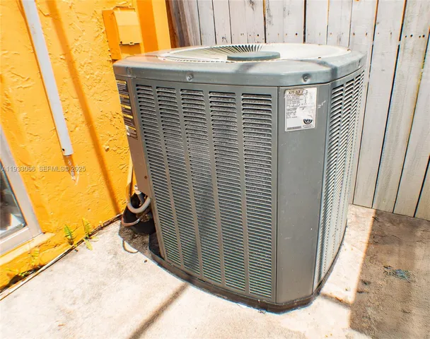 a view of an empty room with glass door