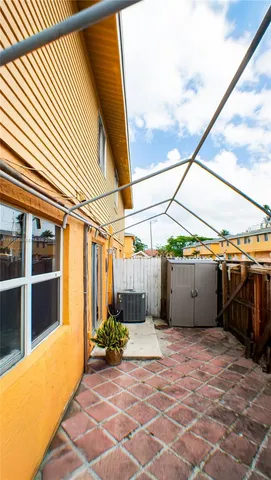 a view of a parked cars in front of a house