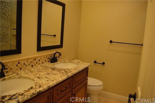 8 Bellezza Irvine, CA 92620 - Photo 21 of 39 Upstairs Secondary Bath with dual vanity