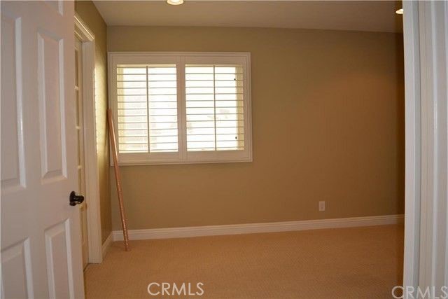 8 Bellezza Irvine, CA 92620 - Photo 23 of 39 Bedroom 2 or Office with French doors to Primary Bedroom