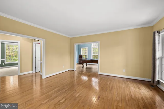 a view of balcony with wooden floor