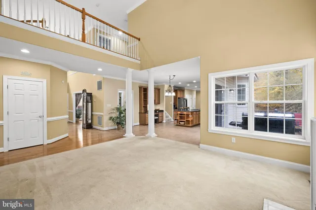 a bedroom with furniture and a chandelier