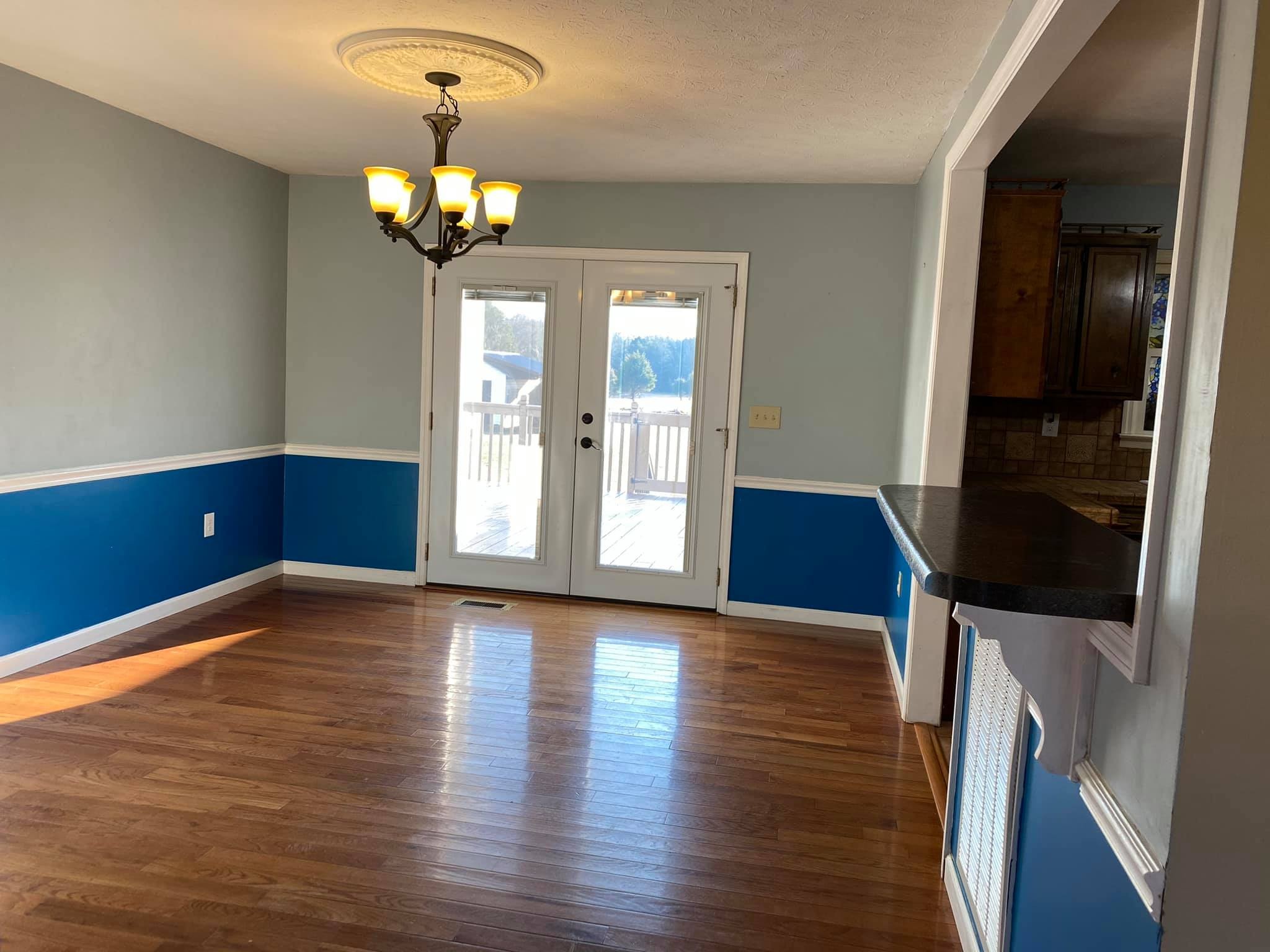 3440 Vesta Road Lebanon, TN 37090 - Photo 11 of 37 a view of an empty room with wooden floor and a window