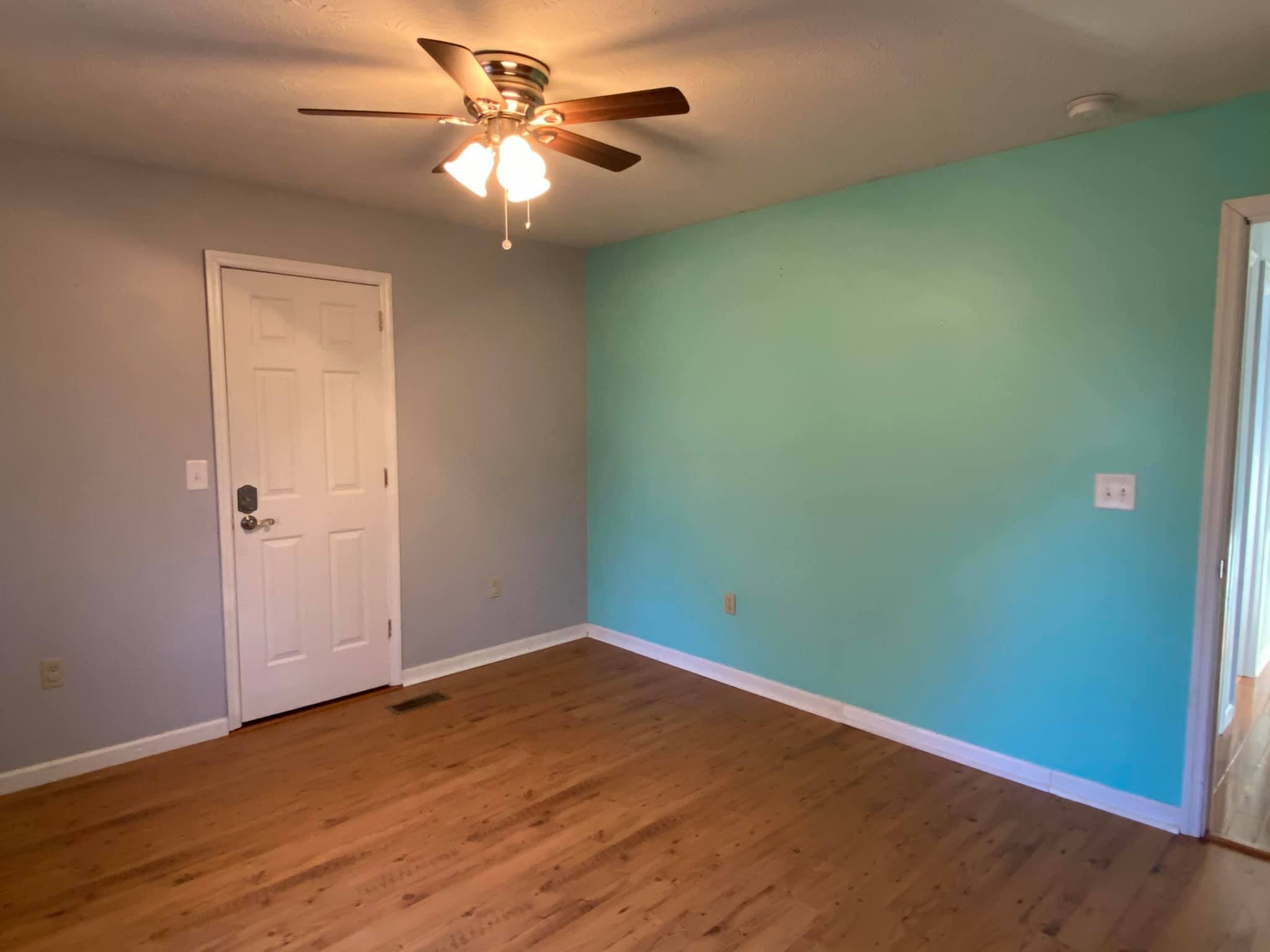 3440 Vesta Road Lebanon, TN 37090 - Photo 13 of 37 an empty room with a fan and a chandelier fan