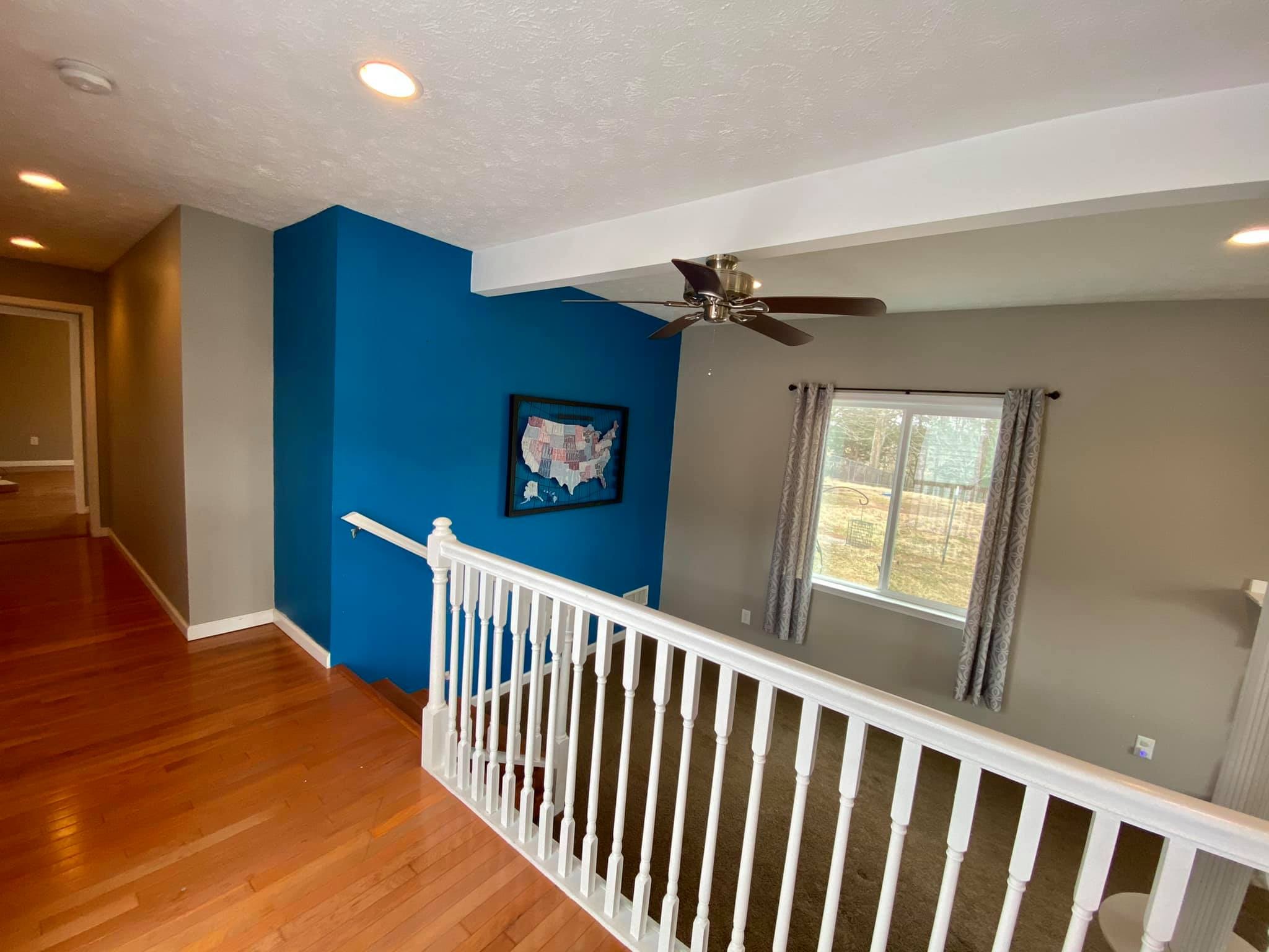 3440 Vesta Road Lebanon, TN 37090 - Photo 15 of 37 a view of hallway with stairs and a wooden floor