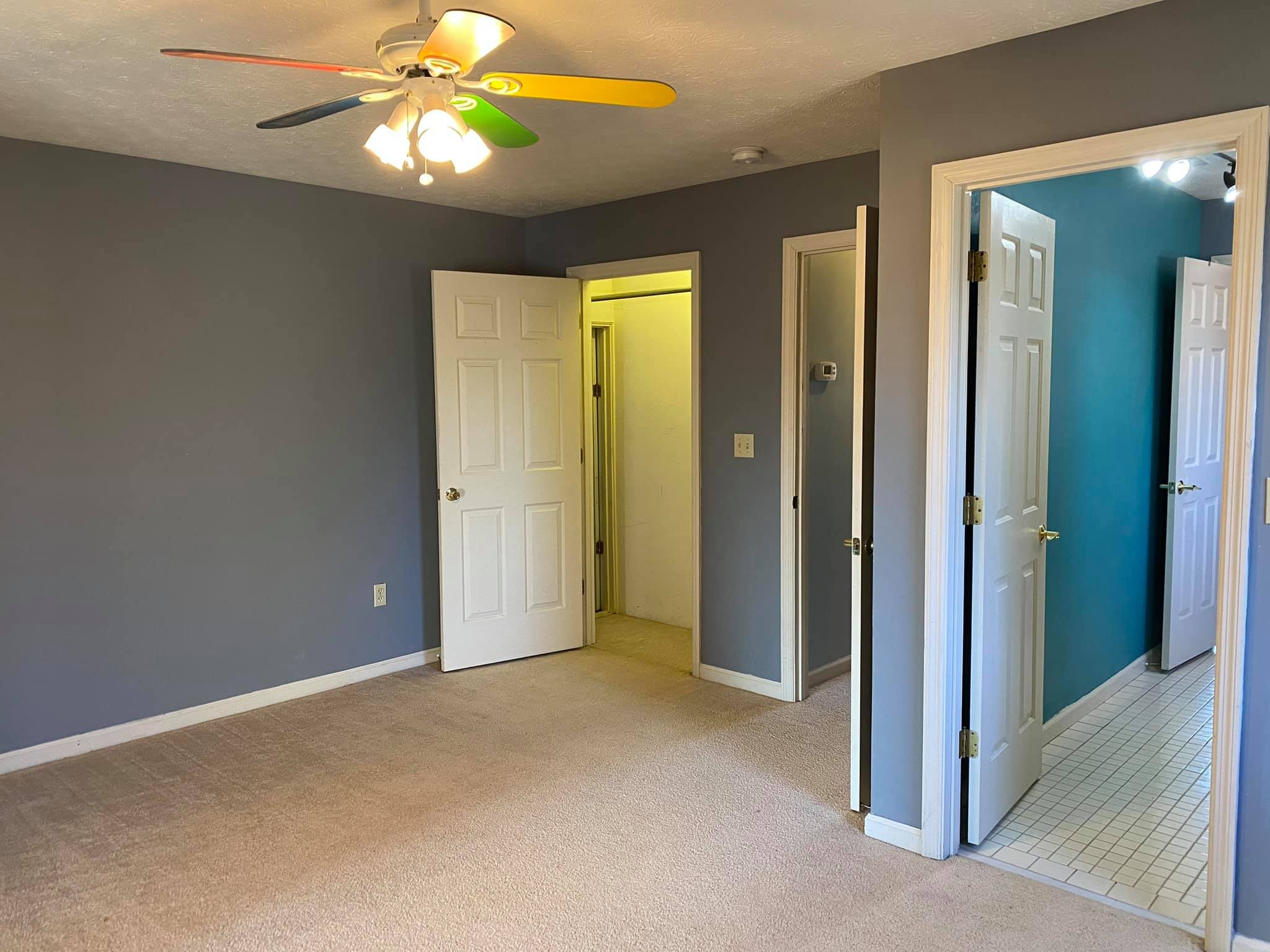 3440 Vesta Road Lebanon, TN 37090 - Photo 17 of 37 a view of an empty room with a chandelier fan