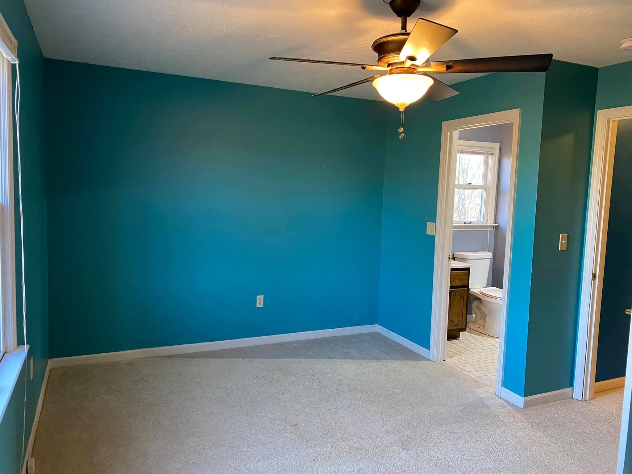 3440 Vesta Road Lebanon, TN 37090 - Photo 19 of 37 a view of an empty room with a chandelier fan