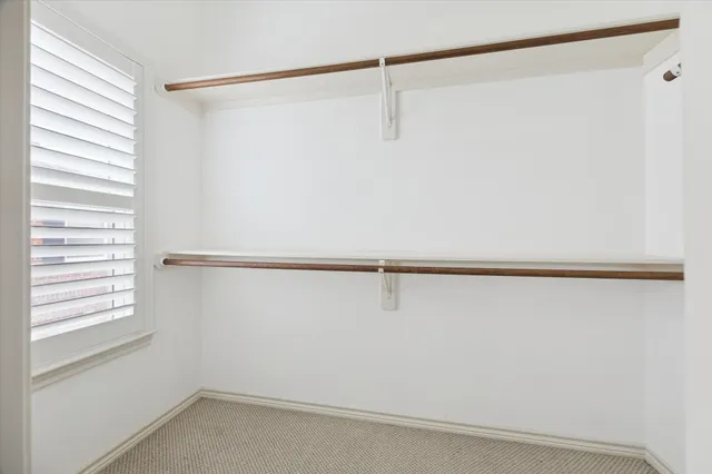 a view of a window in an empty room