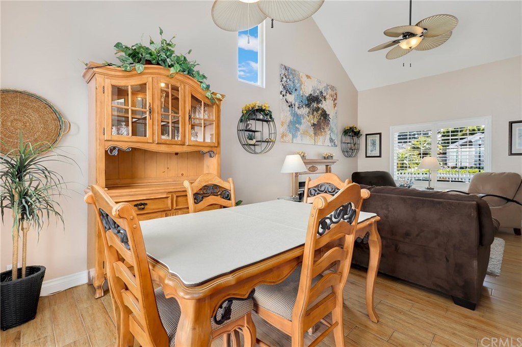 14 Wintermist, Unit 83 Irvine, CA 92614 - Photo 16 of 45 a living room with furniture and a table