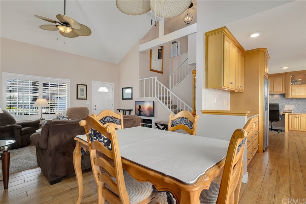 14 Wintermist, Unit 83 Irvine, CA 92614 - Photo 17 of 45 a view of a dining room with furniture window and wooden floor