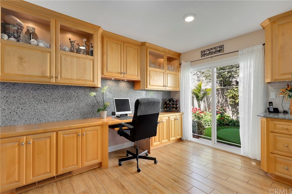 14 Wintermist, Unit 83 Irvine, CA 92614 - Photo 23 of 45 a view of a kitchen with workspace and a window