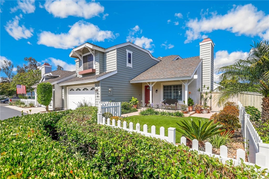 14 Wintermist, Unit 83 Irvine, CA 92614 - Photo 3 of 45 a front view of a house with garden