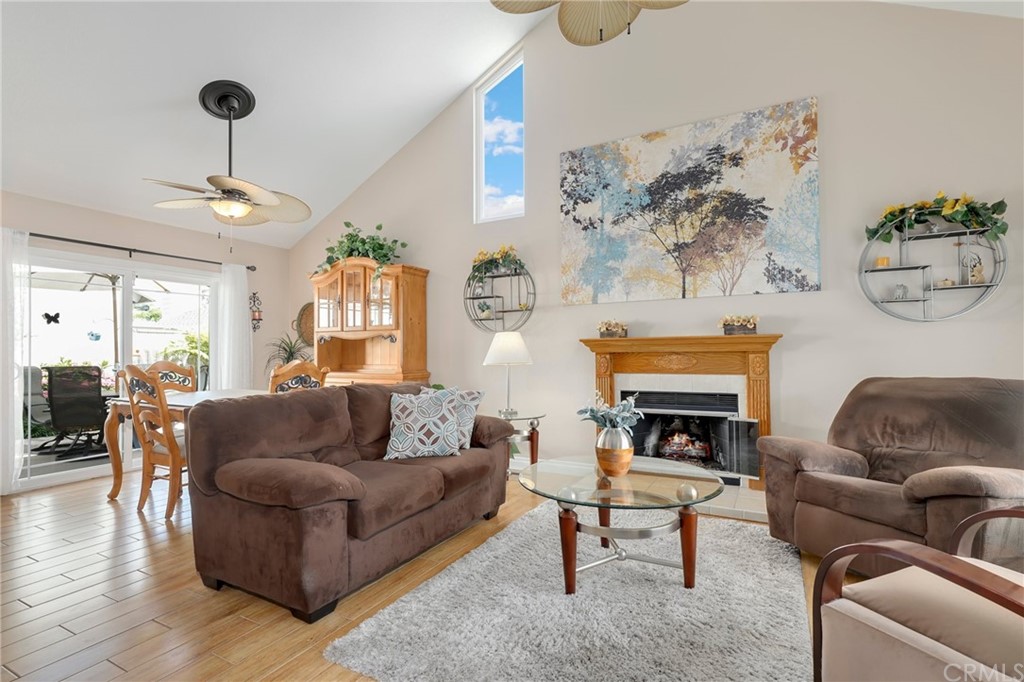 14 Wintermist, Unit 83 Irvine, CA 92614 - Photo 8 of 45 a living room with furniture and a fireplace