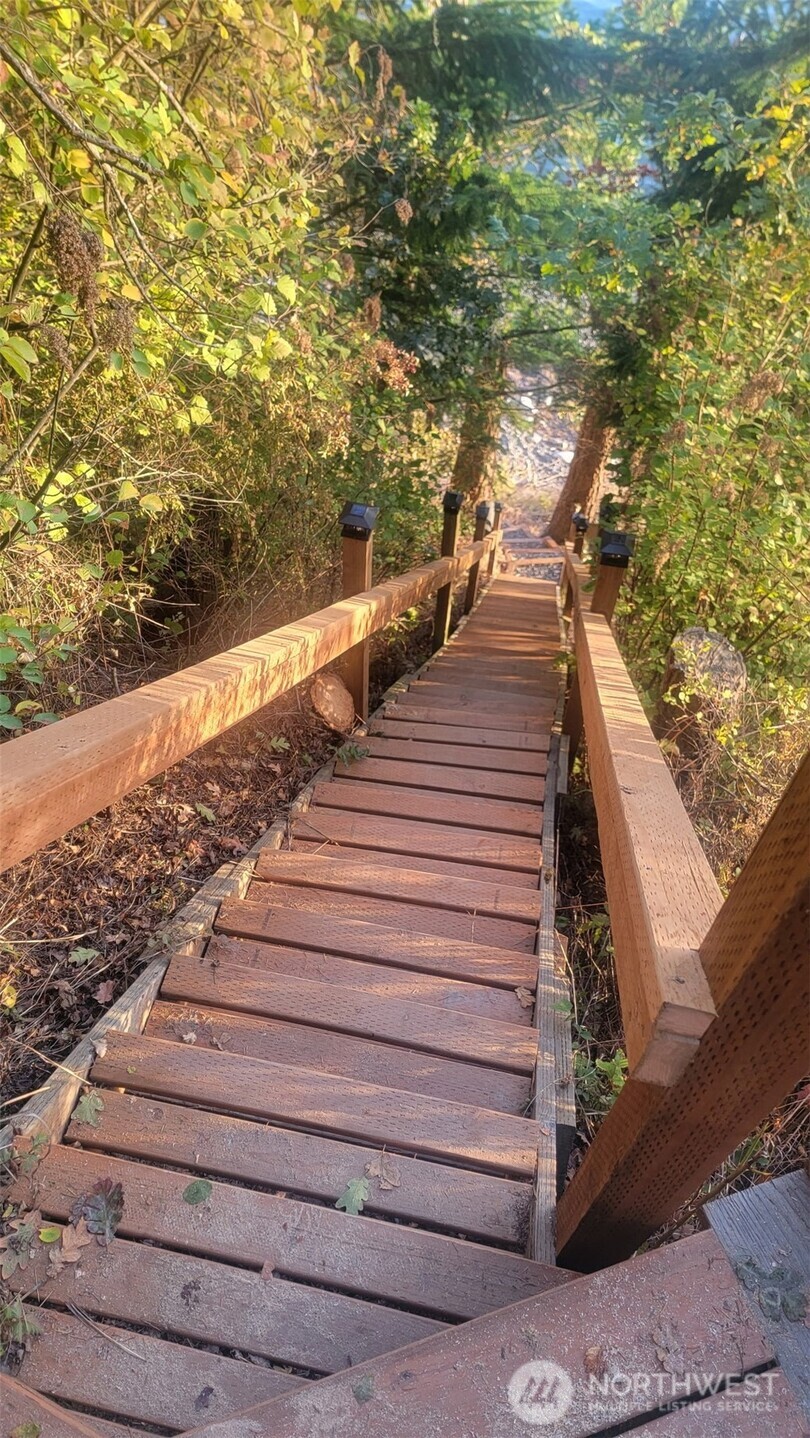 10405 Samish Island Road Bow, WA 98232 - Photo 11 of 38 a view of stairs and wooden floor