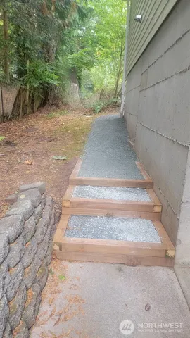 a view of backyard with green space