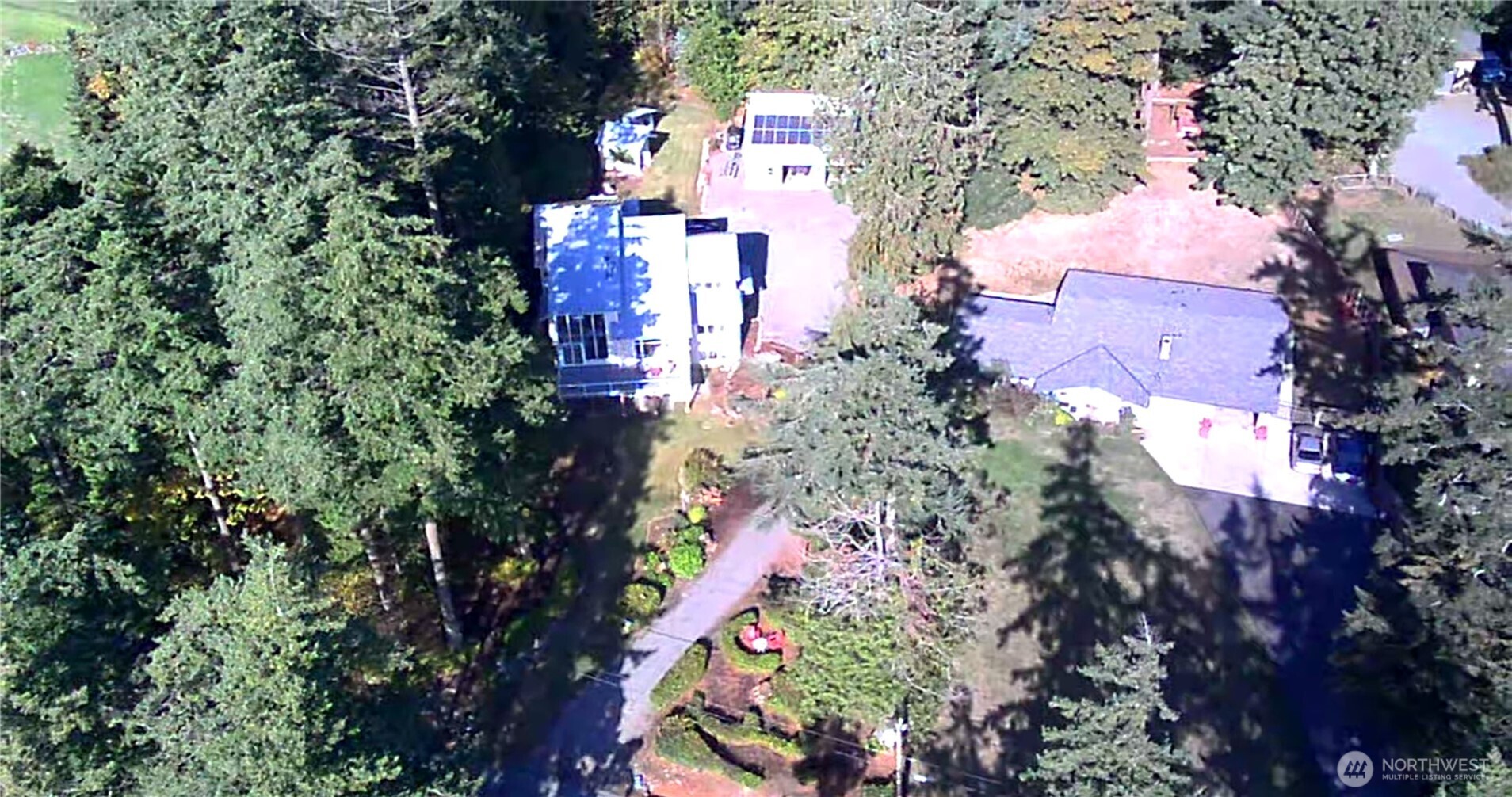 10405 Samish Island Road Bow, WA 98232 - Photo 29 of 38 an aerial view of residential houses with outdoor space