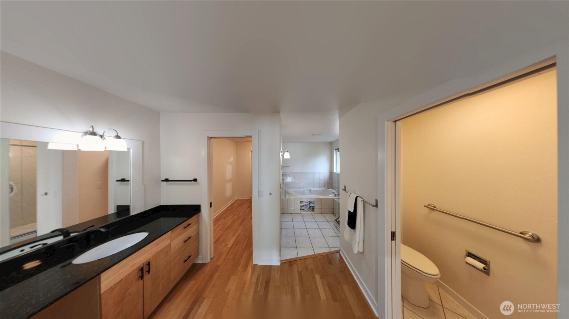 10405 Samish Island Road Bow, WA 98232 - Photo 36 of 38 a large bathroom with a double vanity sink and a mirror
