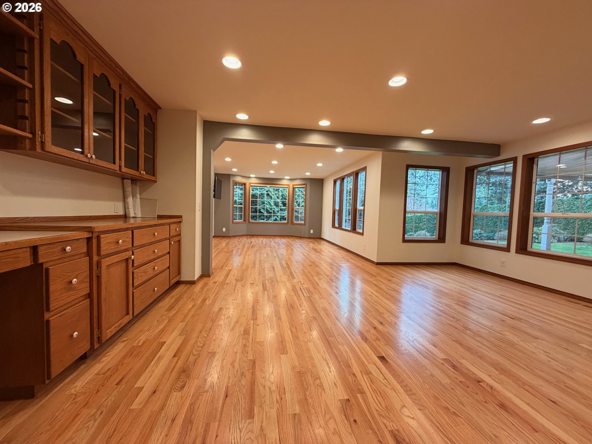 7505 Southwest Schroeder Way Wilsonville, OR 97070 - Photo 5 of 24 a open kitchen with stainless steel appliances granite countertop a dishwasher a stove and a wooden floors
