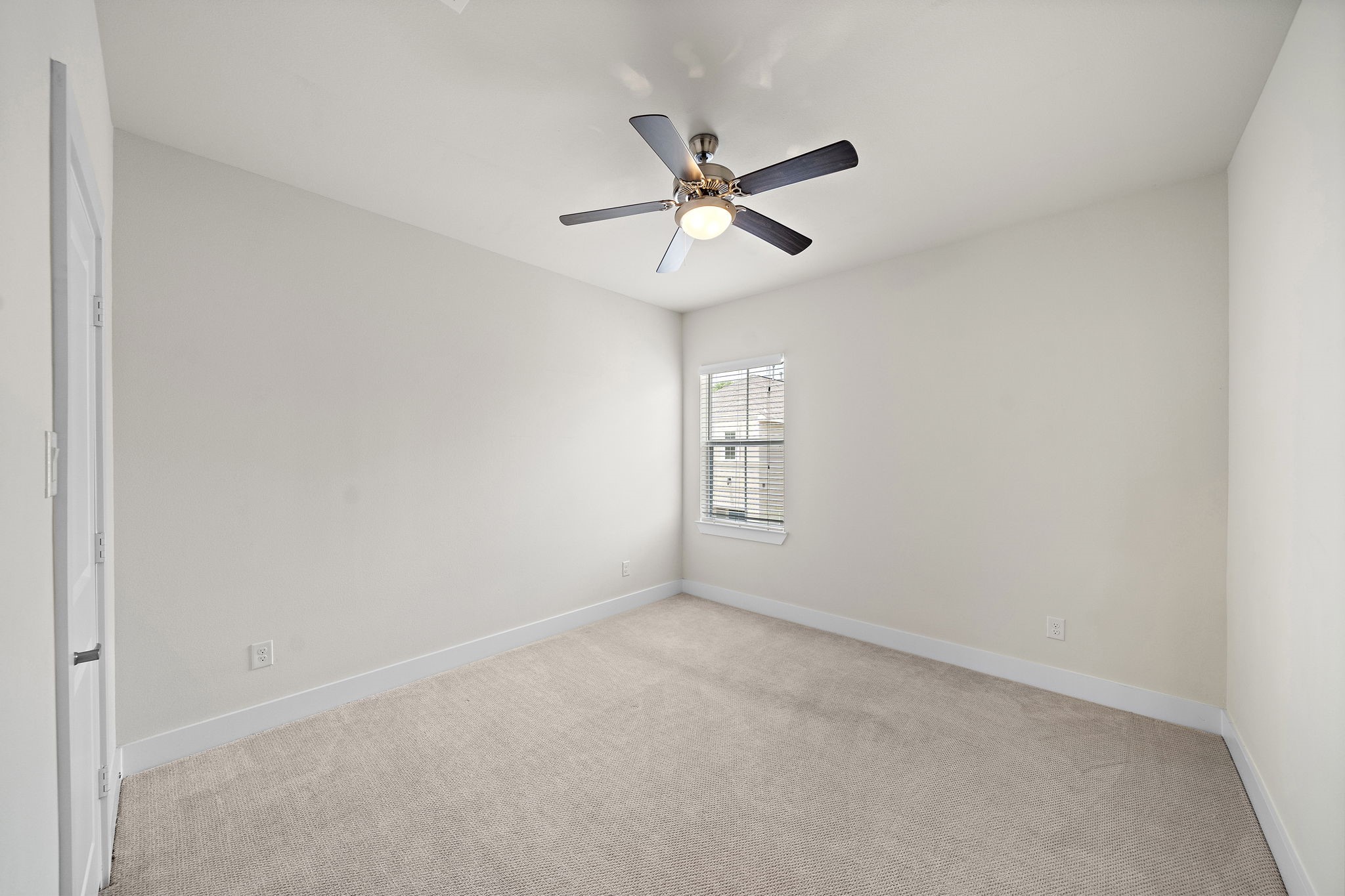 9517 Cedarpost Square Street Houston, TX 77055 - Photo 13 of 20 a view of an empty room with a window