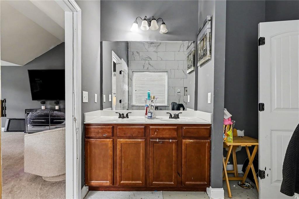 2780 Lakeview Walk Decatur, GA 30035 - Photo 25 of 37 a spacious bathroom with a sink double vanity and a mirror