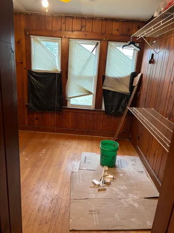 a living room with a window and furniture