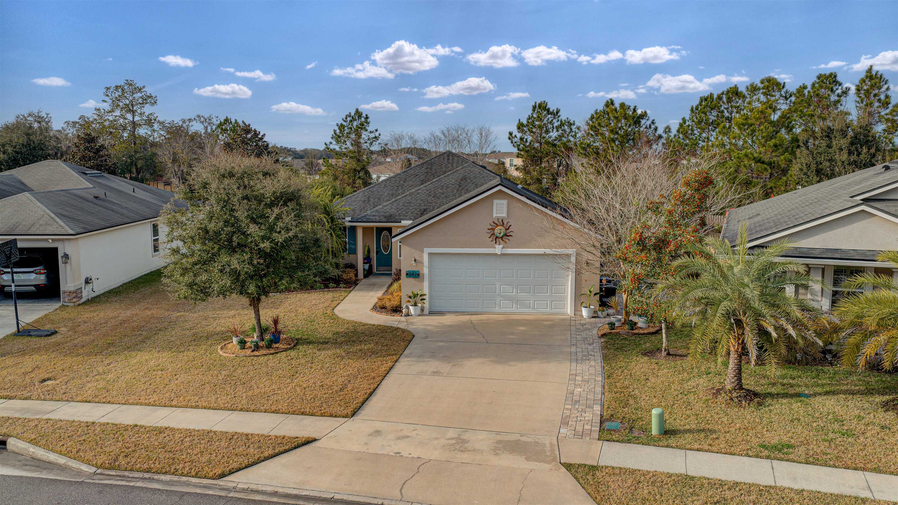 292 North Twin Maple Road St. Augustine, FL 32084 - Photo 16 of 79 a front view of a house with garden