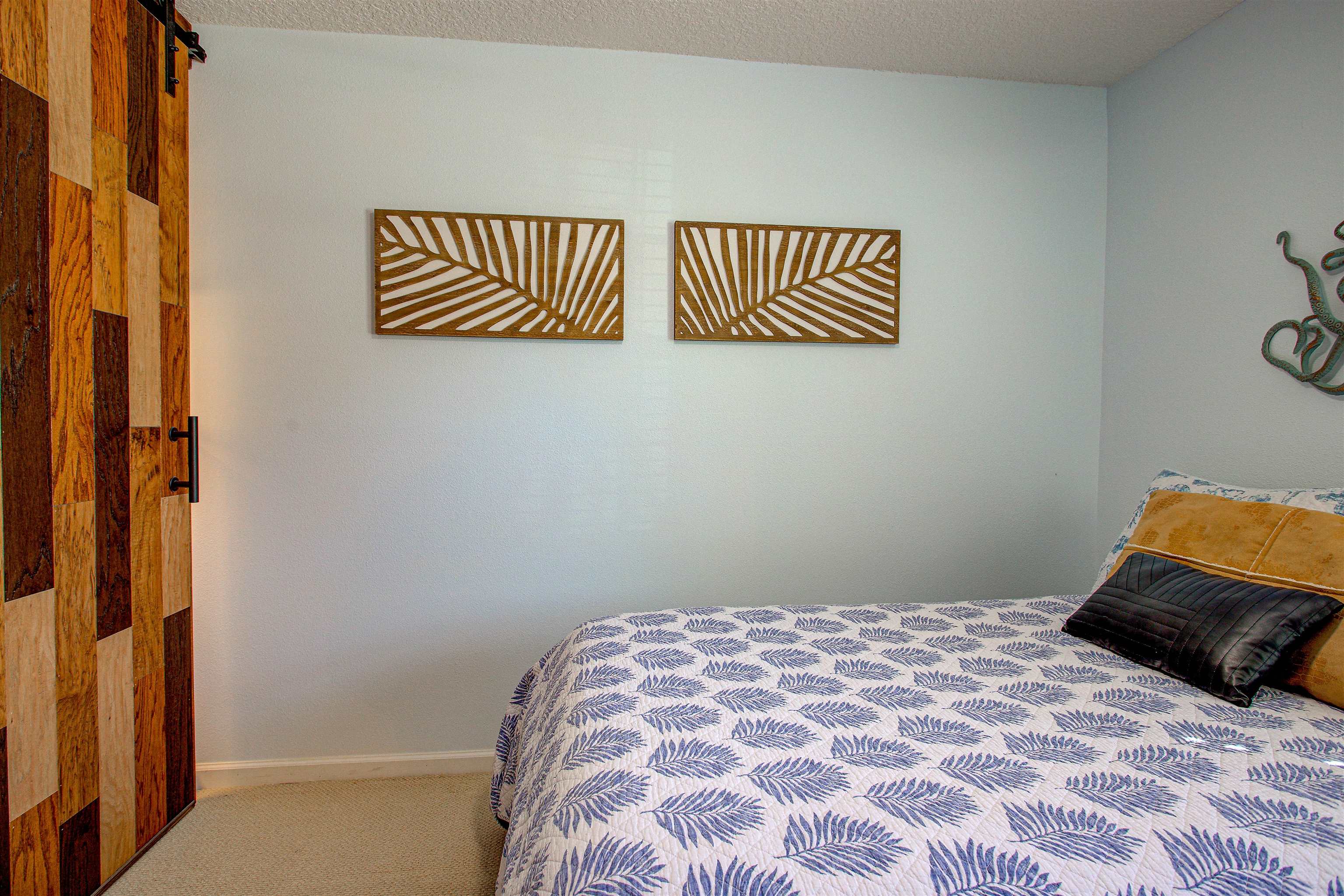 292 North Twin Maple Road St. Augustine, FL 32084 - Photo 27 of 79 a bedroom with a bed and a lamp on dresser