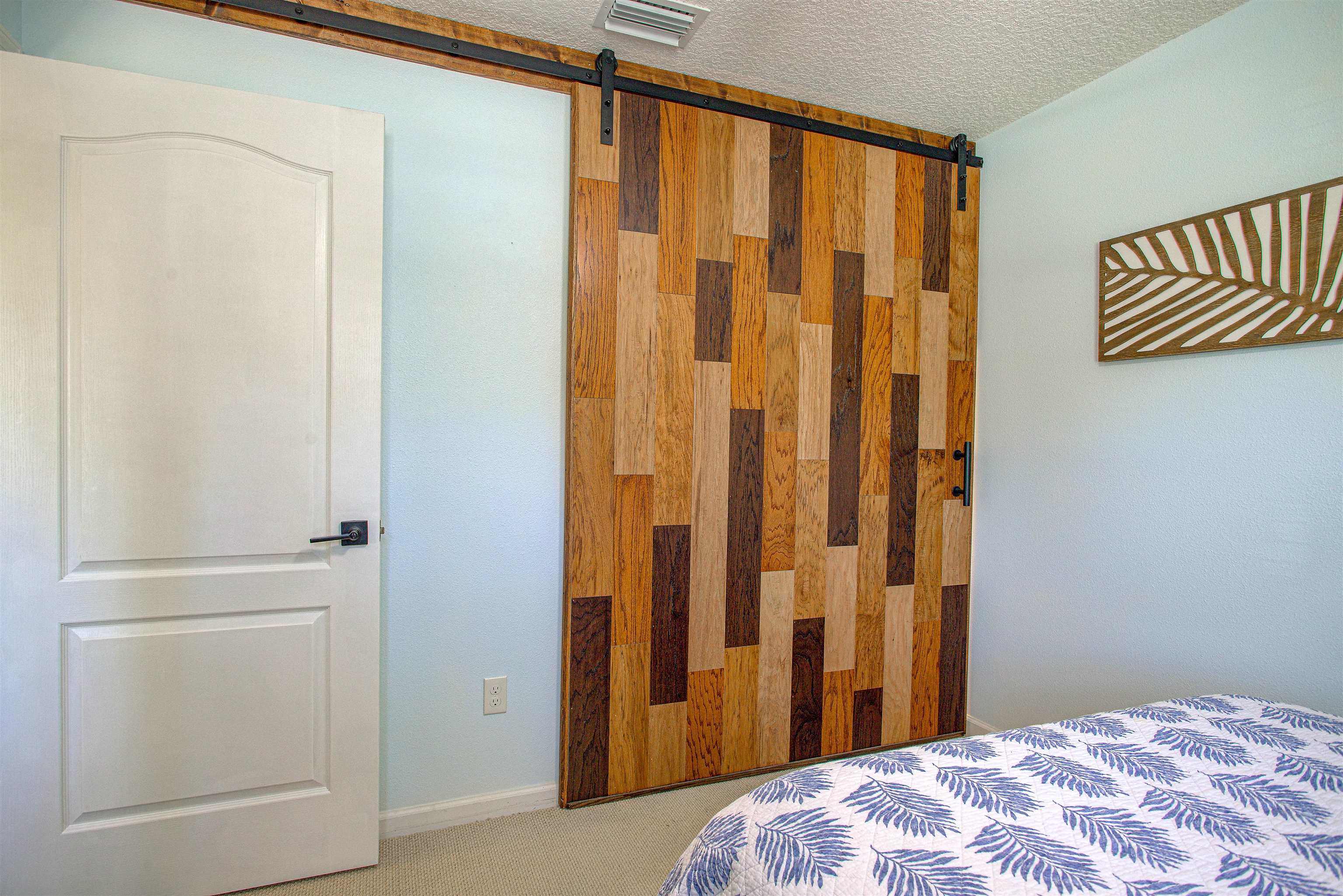 292 North Twin Maple Road St. Augustine, FL 32084 - Photo 29 of 79 a bedroom with a bed and a window