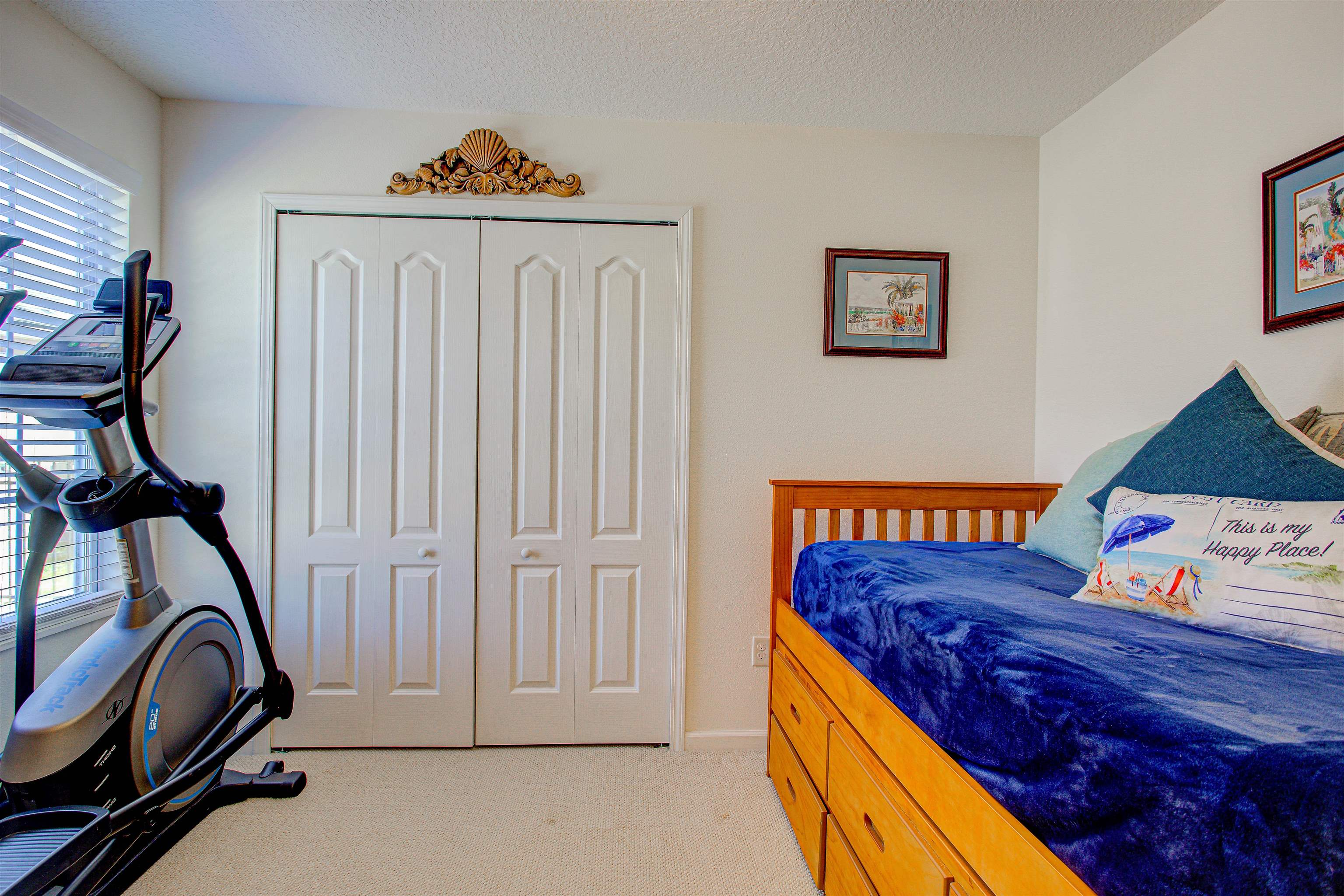 292 North Twin Maple Road St. Augustine, FL 32084 - Photo 39 of 79 a bedroom with a bed and a painting on the wall