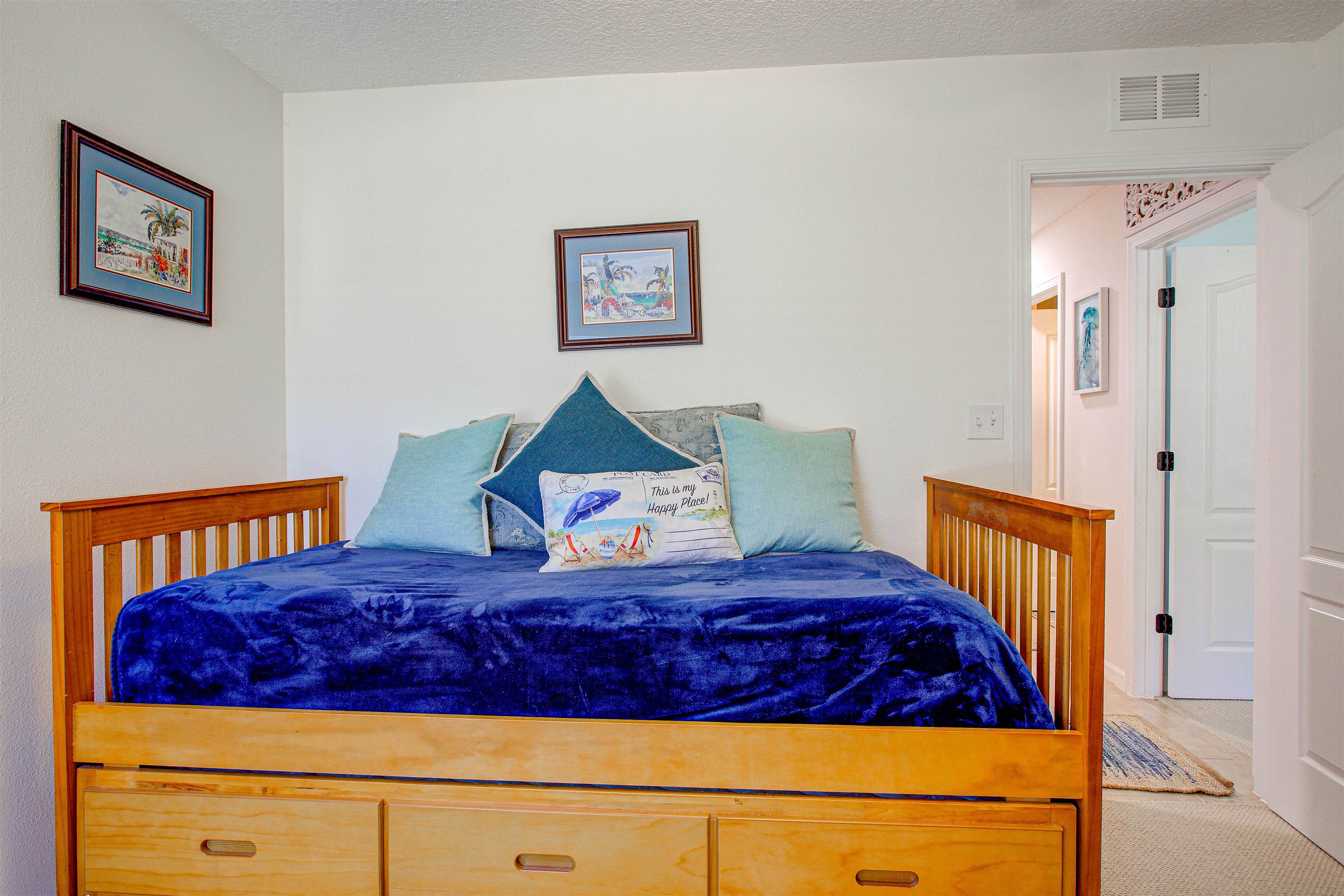 292 North Twin Maple Road St. Augustine, FL 32084 - Photo 40 of 79 a bedroom with a bed and a painting on the wall