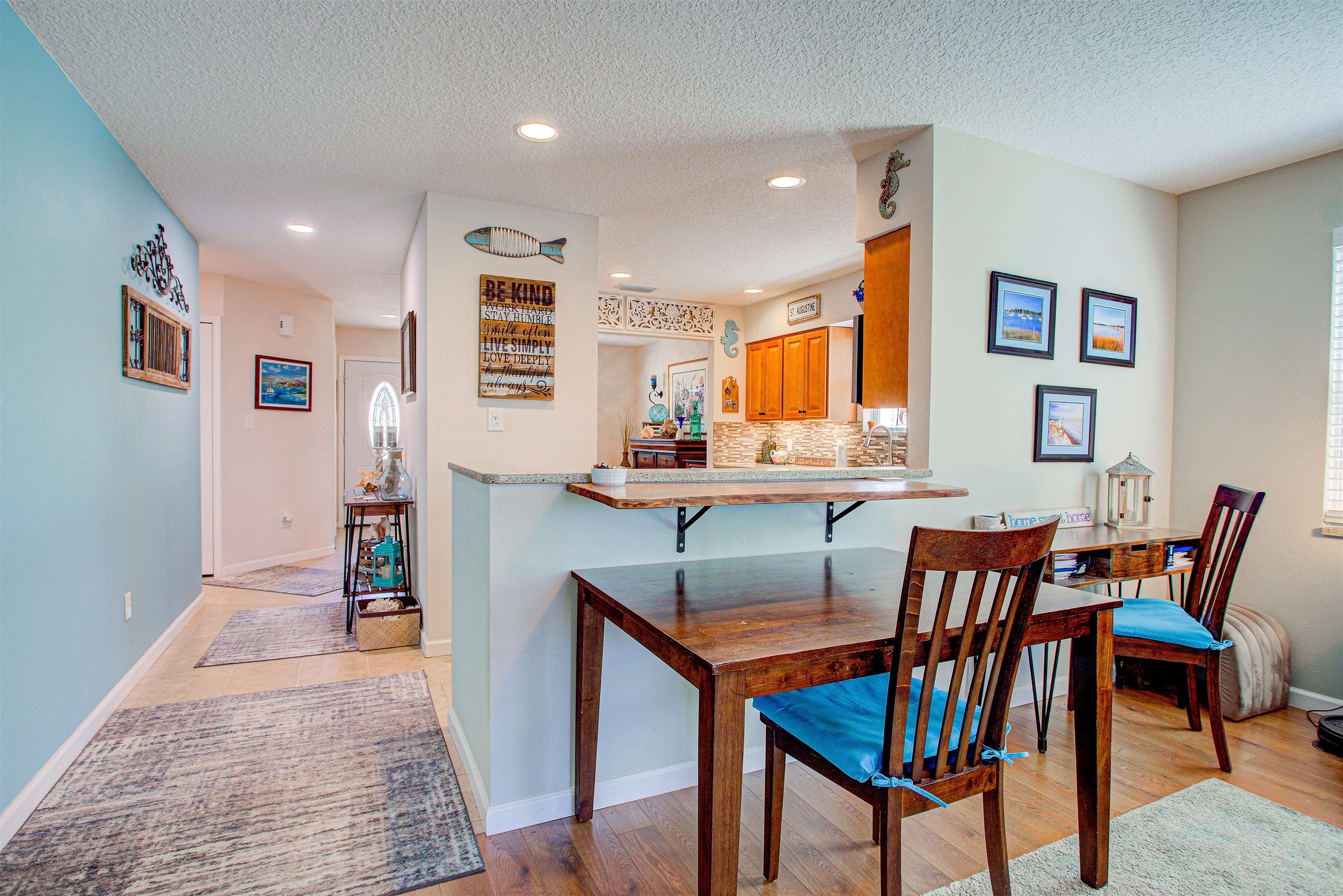 292 North Twin Maple Road St. Augustine, FL 32084 - Photo 46 of 79 a dining room with furniture and wooden floor