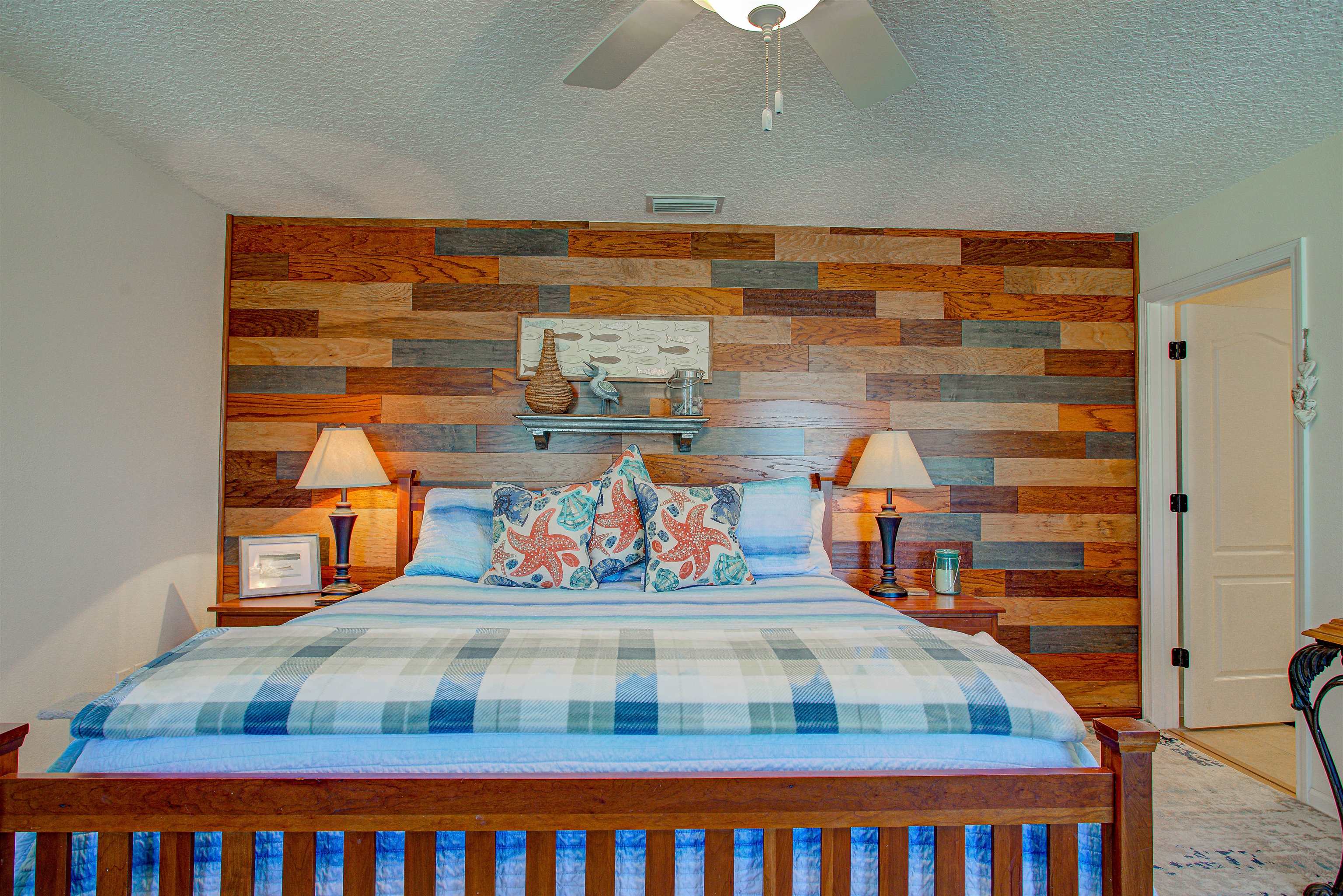 292 North Twin Maple Road St. Augustine, FL 32084 - Photo 52 of 79 a bedroom with a bed and a book shelf