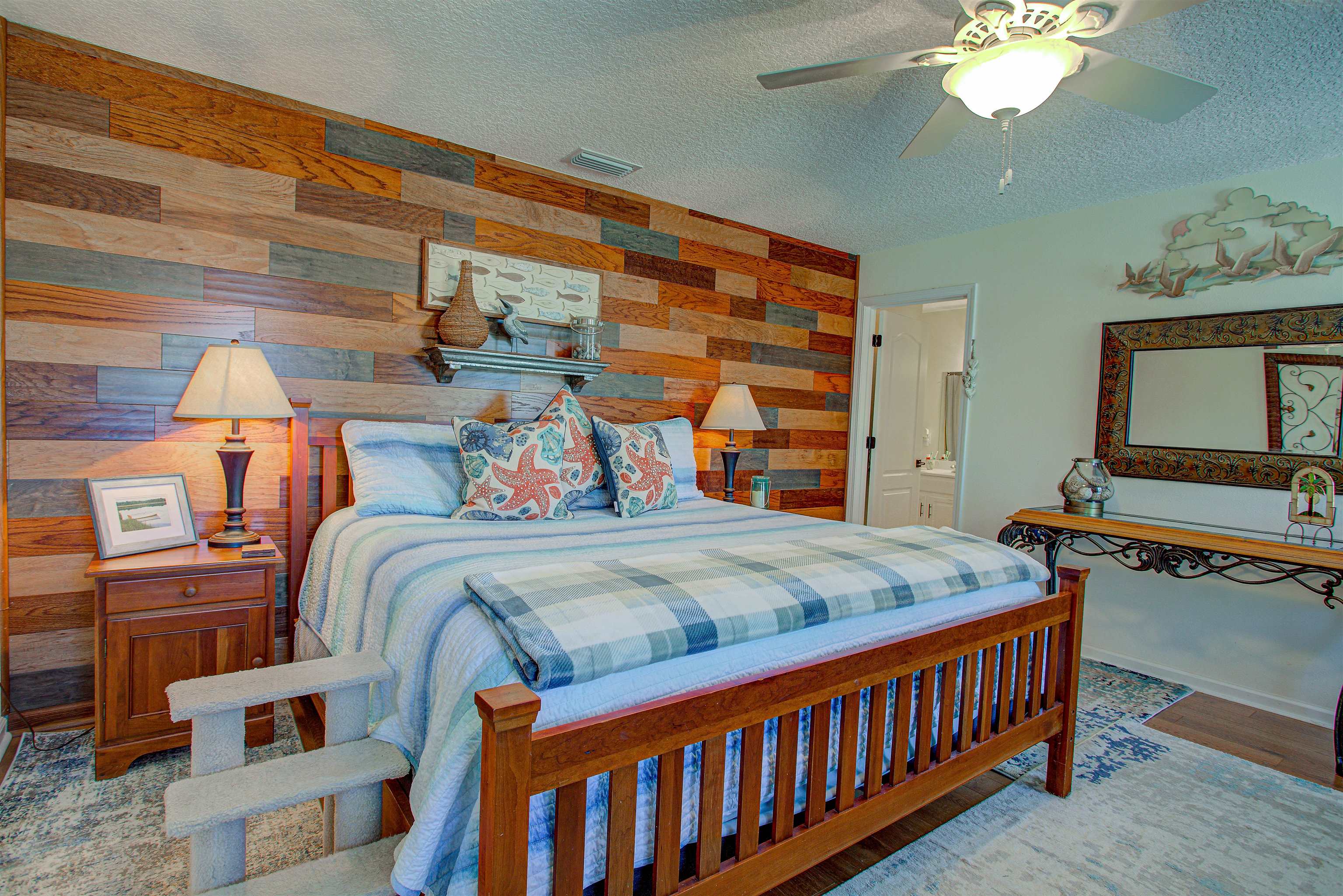 292 North Twin Maple Road St. Augustine, FL 32084 - Photo 53 of 79 a bedroom with furniture and a chandelier