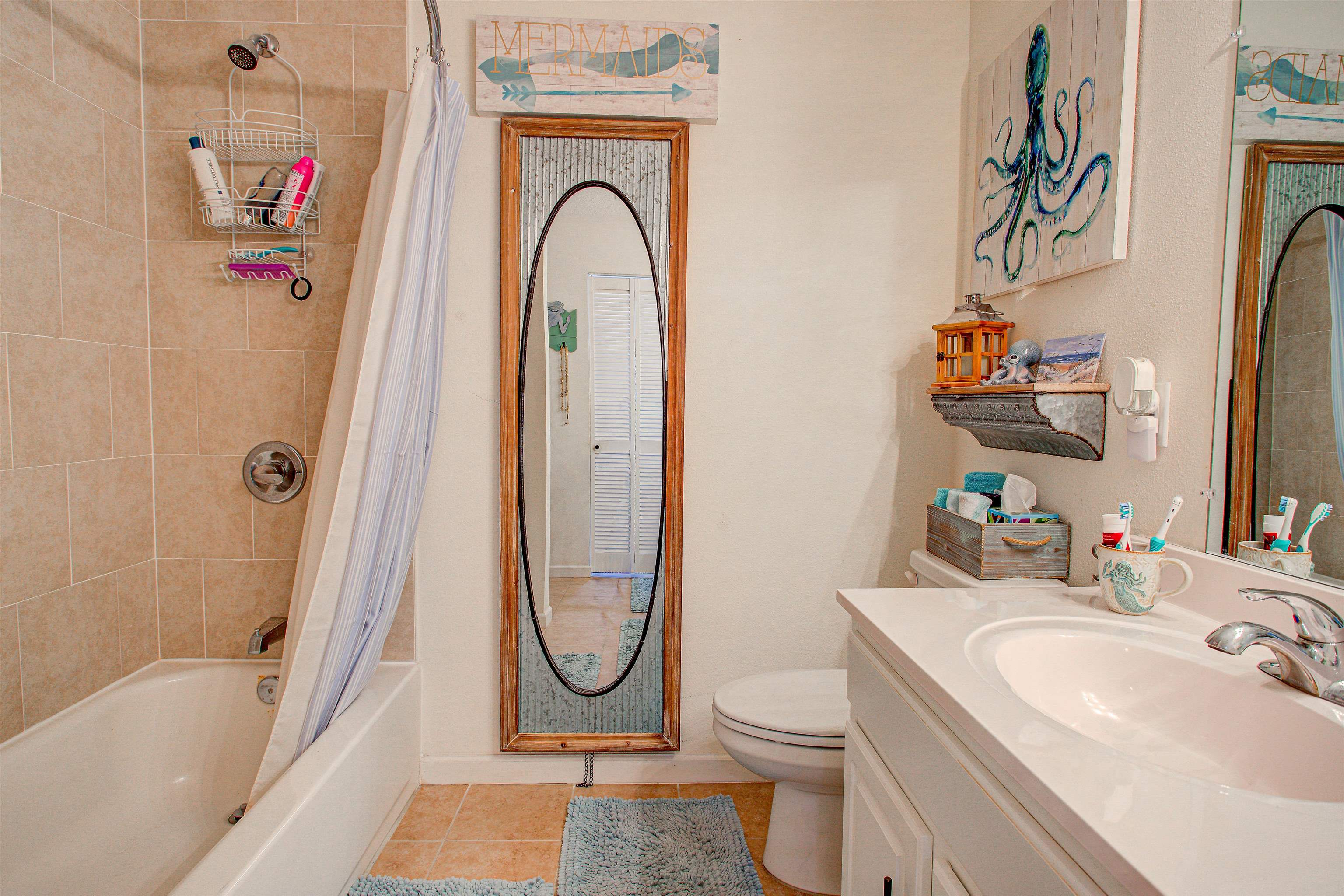 292 North Twin Maple Road St. Augustine, FL 32084 - Photo 57 of 79 Bathroom with shower / bath combo with shower curtain, vanity, and light tile patterned floors