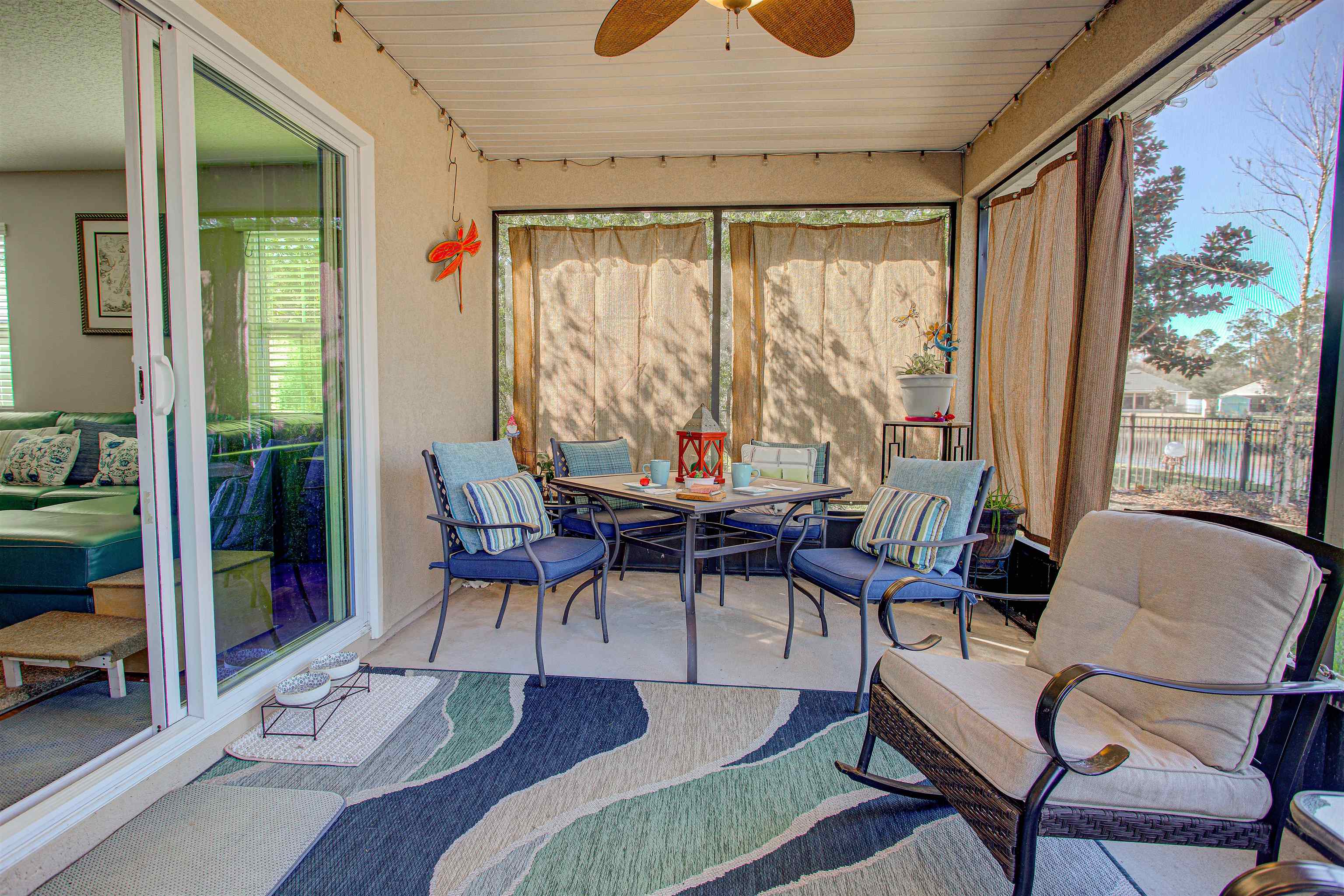 292 North Twin Maple Road St. Augustine, FL 32084 - Photo 62 of 79 a living room with furniture and a large window