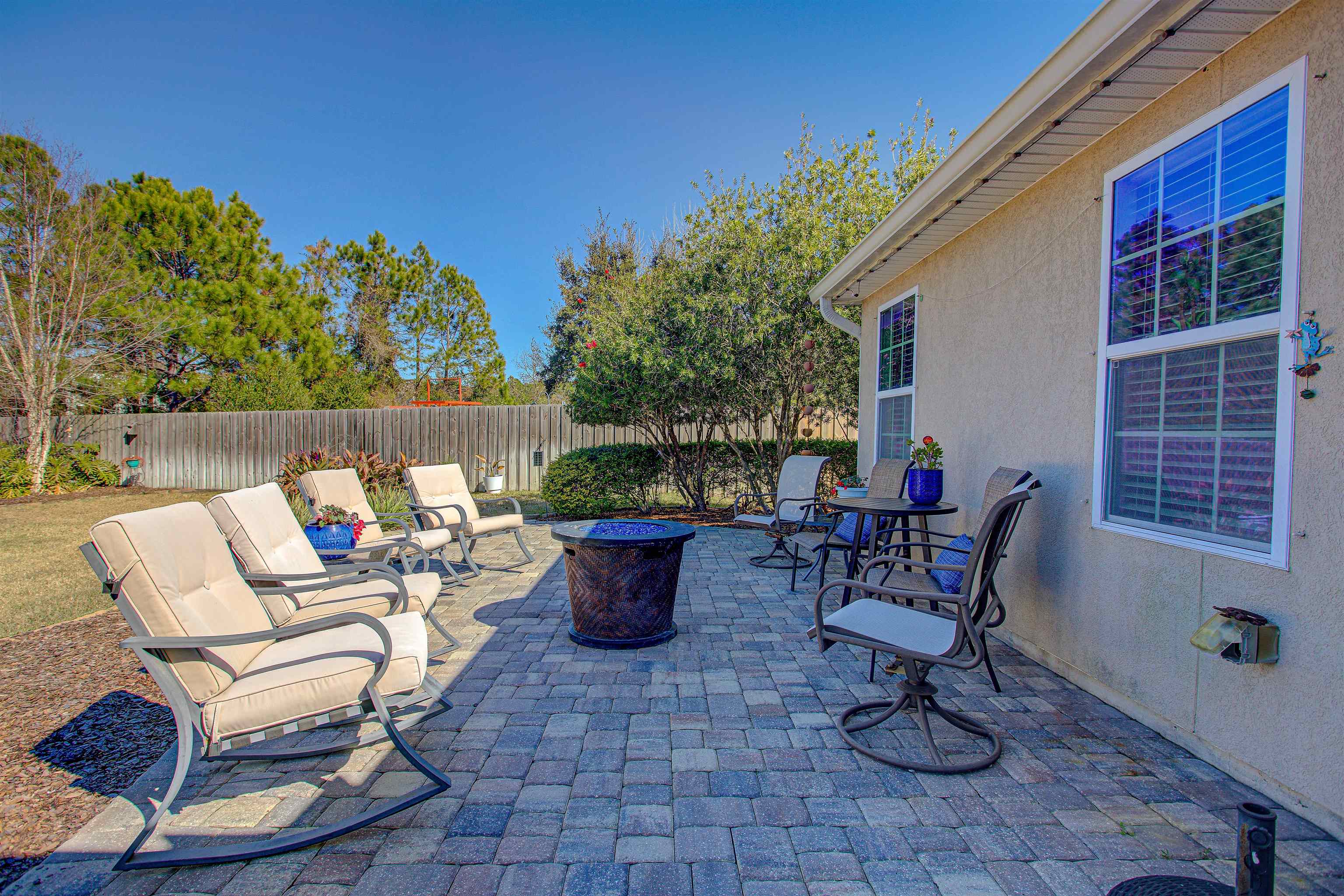 292 North Twin Maple Road St. Augustine, FL 32084 - Photo 64 of 79 Fenced backyard featuring a patio area and a fire pit