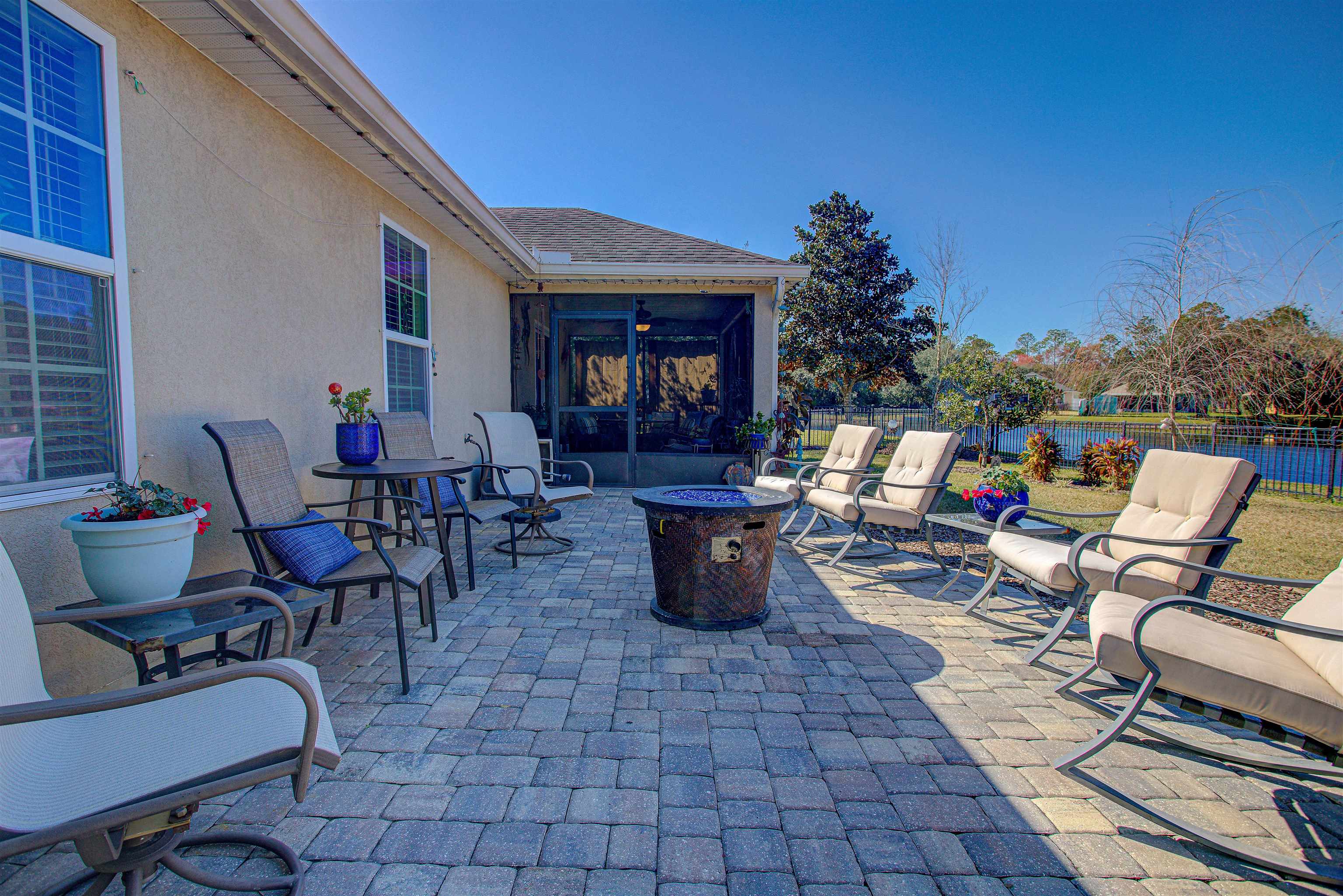 292 North Twin Maple Road St. Augustine, FL 32084 - Photo 71 of 79 View of patio / terrace with a sunroom and a fire pit